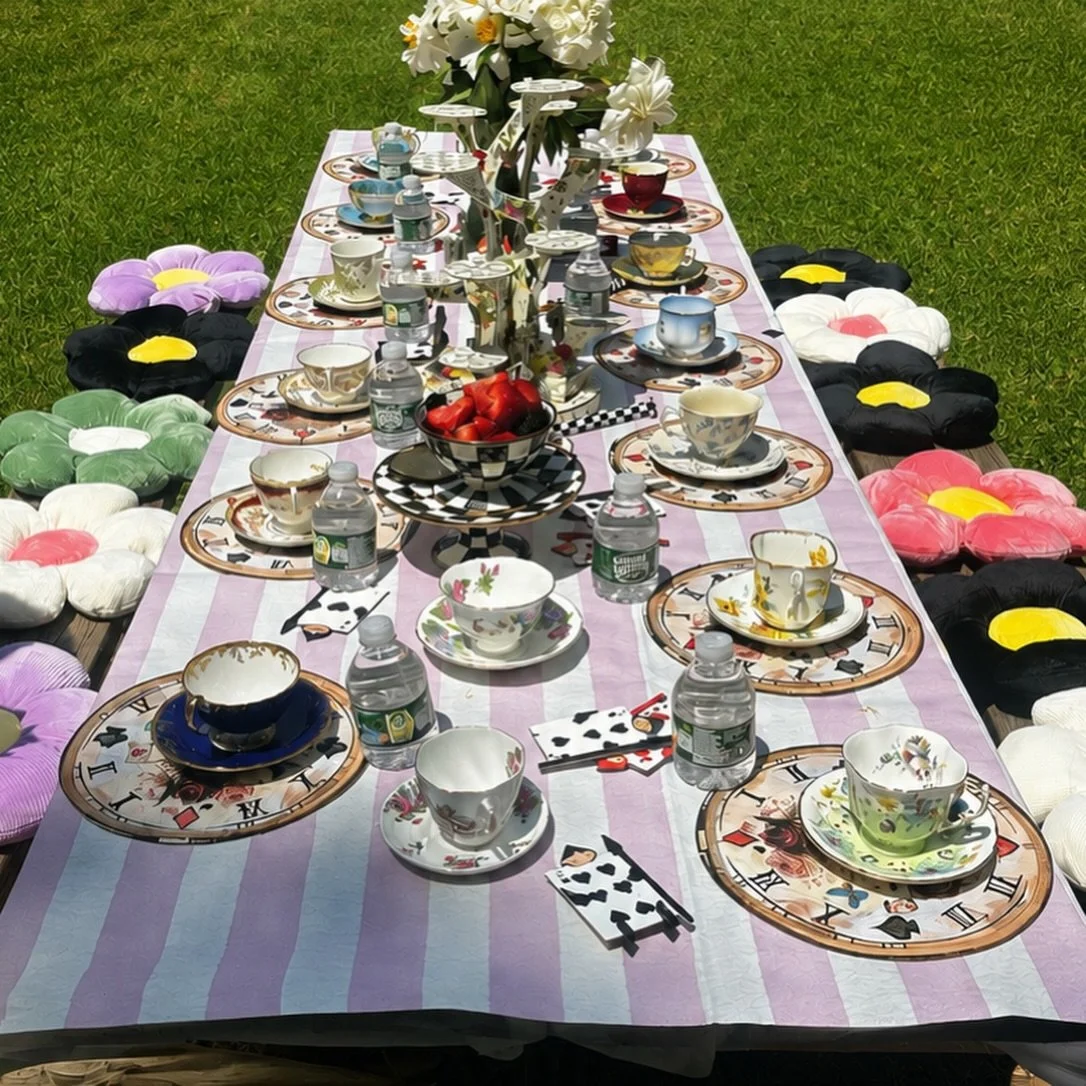 A little glimpse of the magic of the middle school girls&rsquo; Alice in Wonderland luncheon today and the moms behind it all. What a great end to the year!