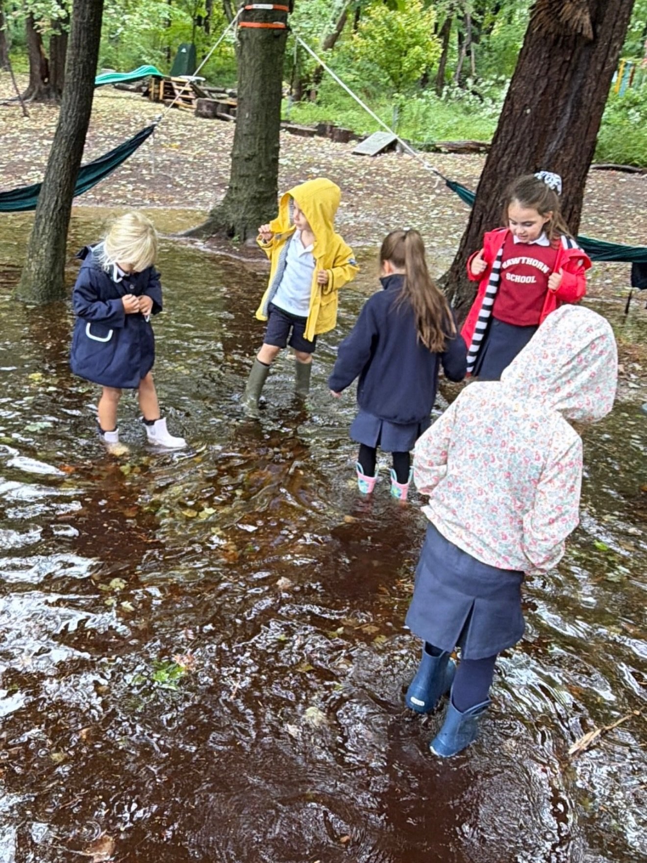 Three days of rain has not slowed down the @hawthorn_roots_and_reason program! In fact, Mrs. Mattis reports that the children are loving all the new water features!