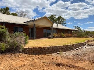 rural wa backyard in bindoon prior to pool excavation and retaining works