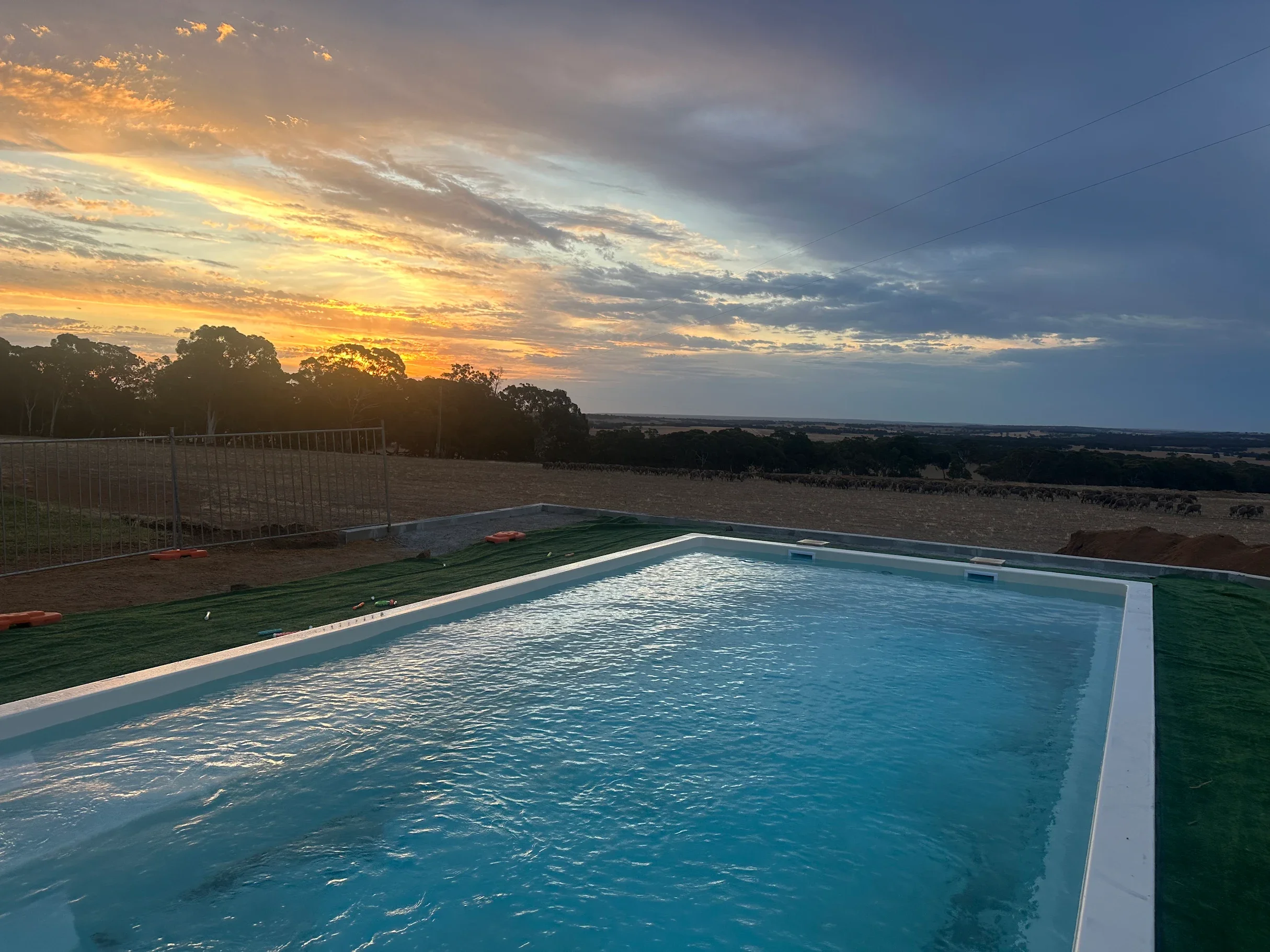 Pool Install across the rolling hills of Perth with outstanding sunset view
