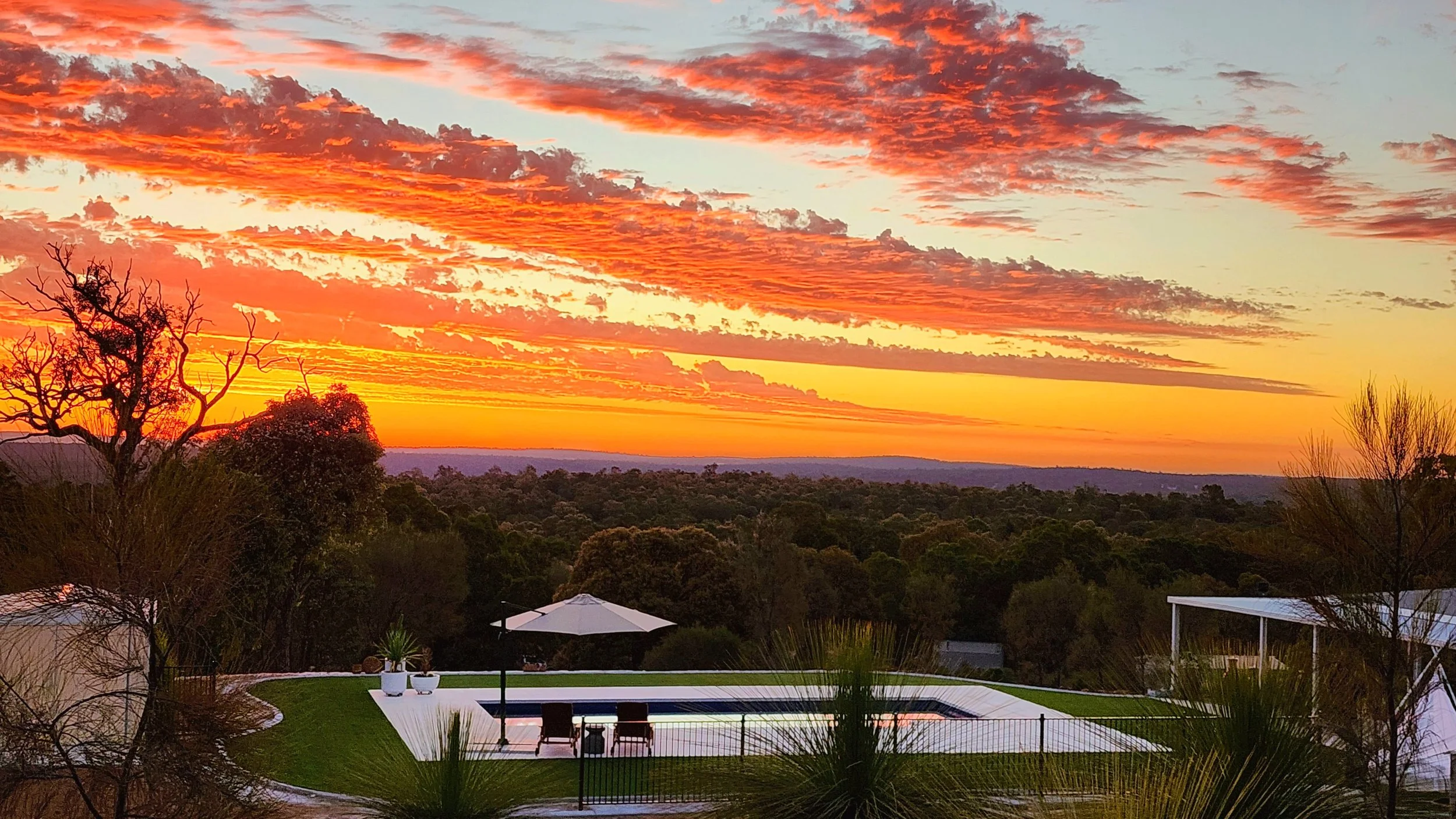 Pool install by local pool builders Countrywide Pools overlooking the Perth Hills in Morangup