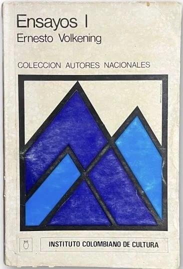 Cover of a book titled 'Ensayos I' by Ernesto Volkening, part of the collection 'Autores Nacionales,' published by the Instituto Colombiano de Cultura. The cover features a geometric design with blue and purple mountain shapes.