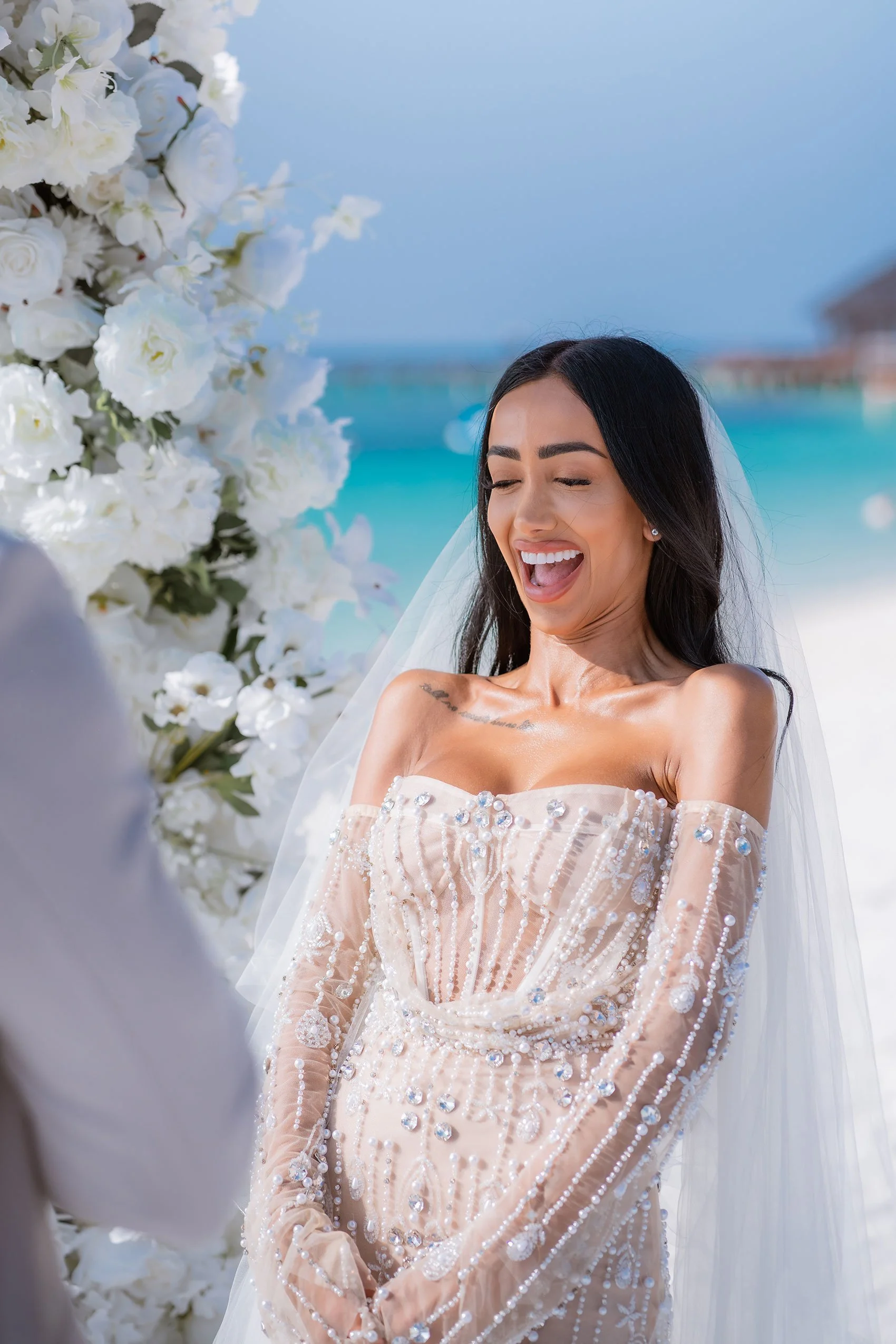 bride-laughing-wedding-maldives.jpg