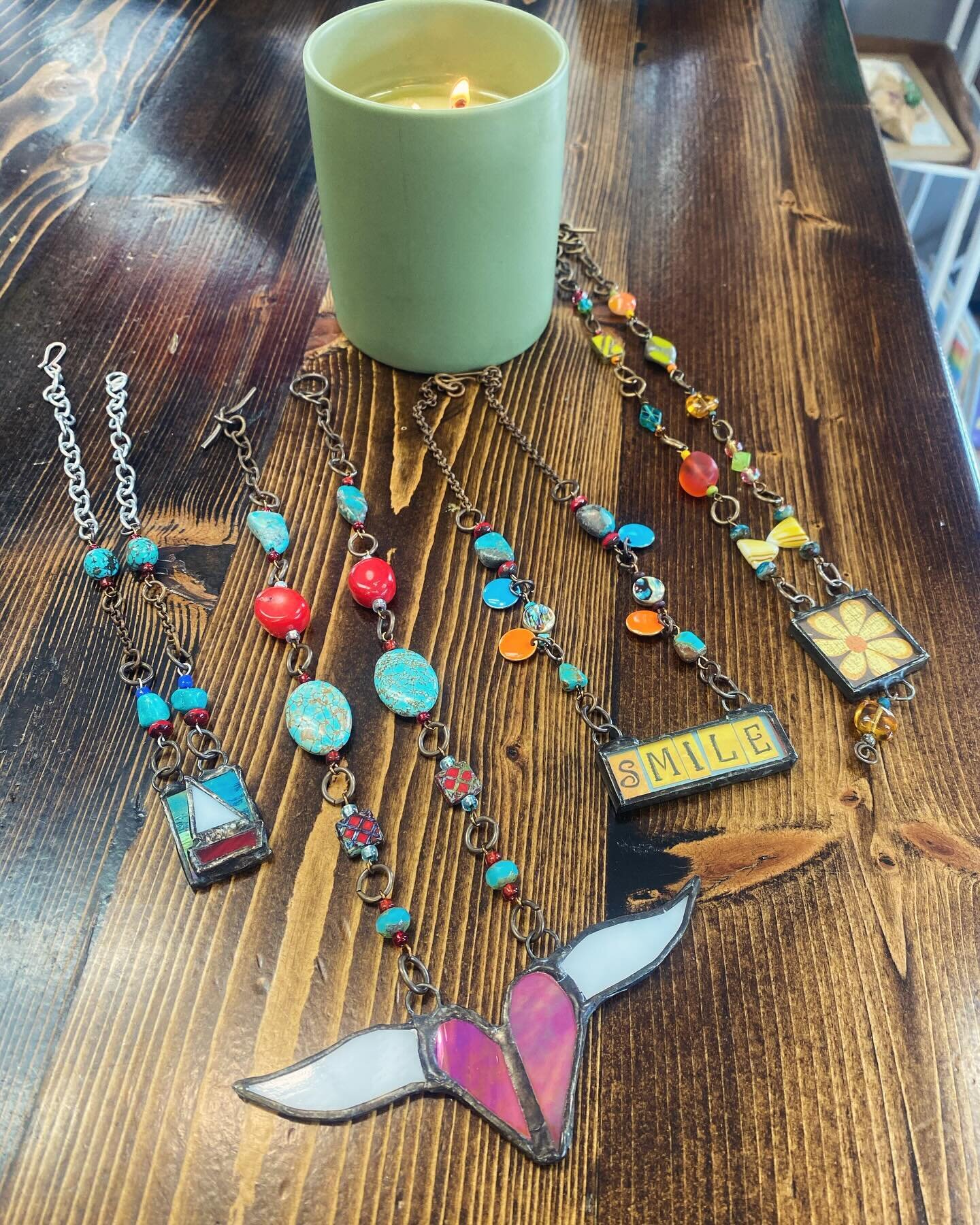 Tell me these aren&rsquo;t the most fun and creative stained-glass necklaces on the planet! The shop is full of creativity and happiness today with the beautiful getaway scent of the &ldquo;Pass the Sunscreen&rdquo; candle by @porchlightcandlecompany