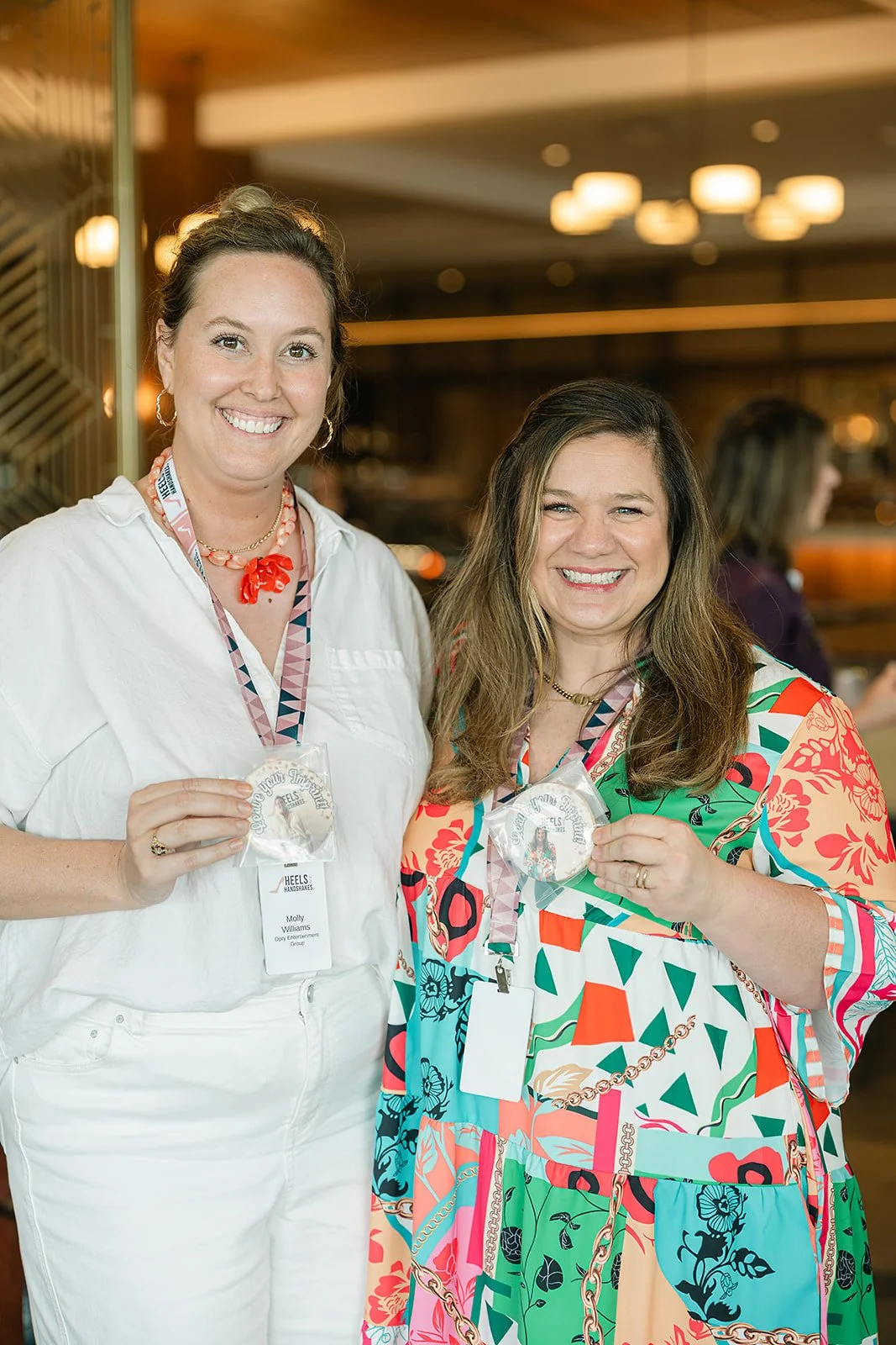 heels-and-handshakes-attendees-with-custom-photo-cookies.jpg.jpg