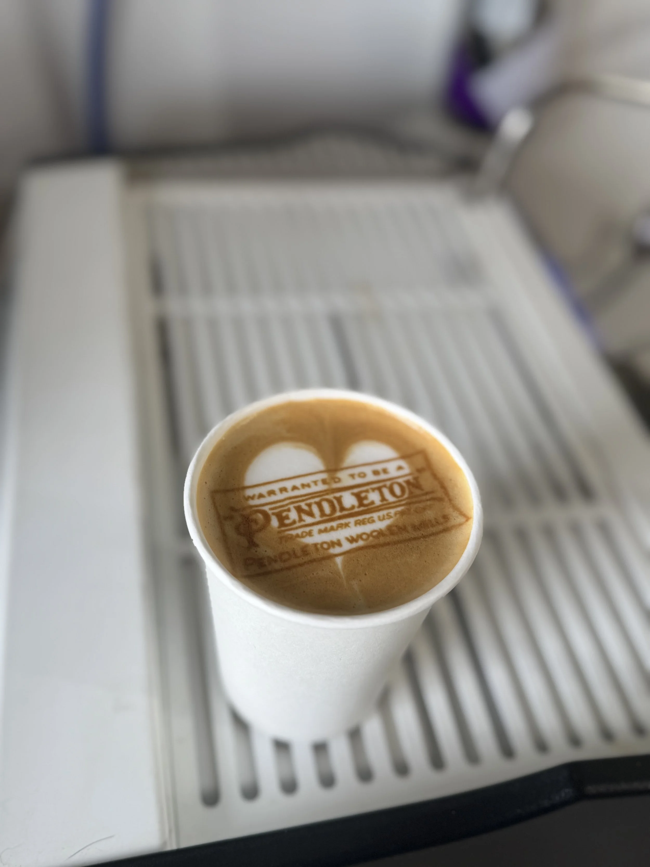 Custom latte art printing with company logo for brand activation coffee service in Portland
