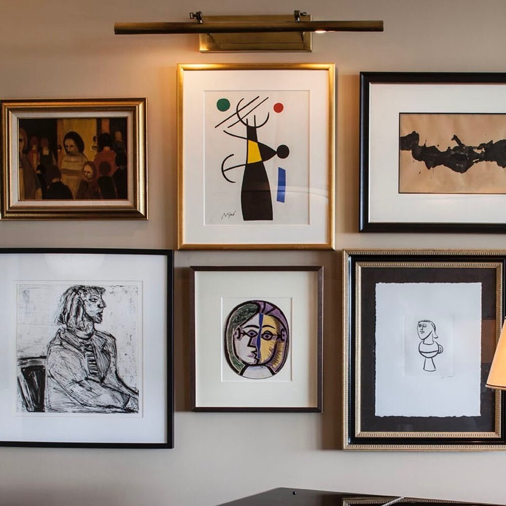 An example of the way order can be made out of disparate elements. Different frames, different styles of art, but they all come together when properly arranged. 

#interiordesign #artwall #picasso #mir&oacute;