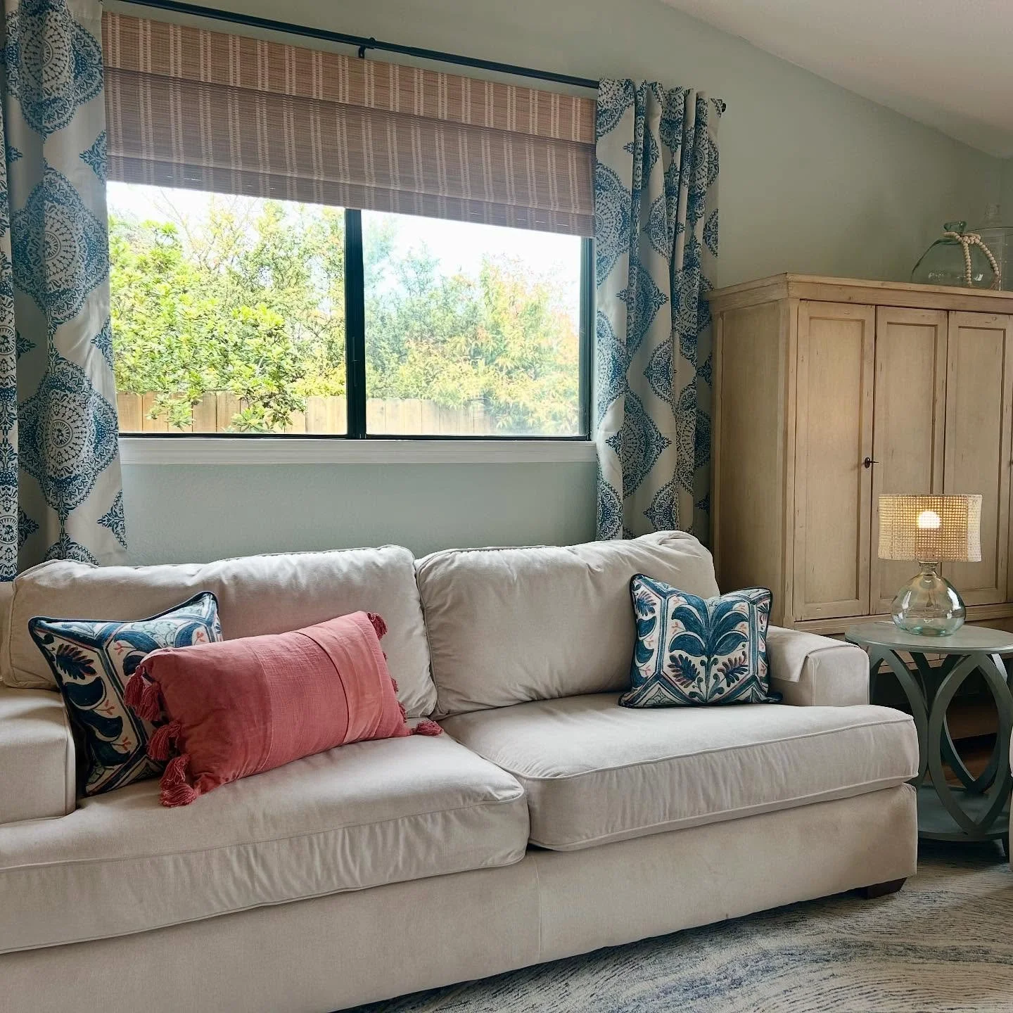 My client wanted an elegant, coastal feel for her living &amp; dining room refresh. She needed space for her large dog and storage for her eclectic finds. Pattern play made her heart sing and we delivered on her love of all things blue! We also manag