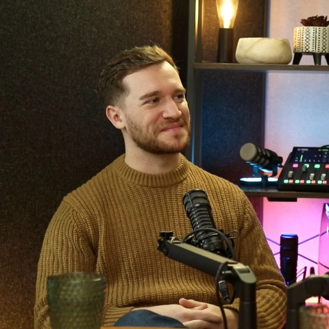 photo of a man recording a podcast