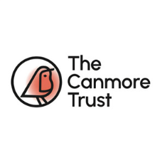 Logo of The Canmore Trust featuring a stylized red and black mountain inside a circle alongside the organization's name.