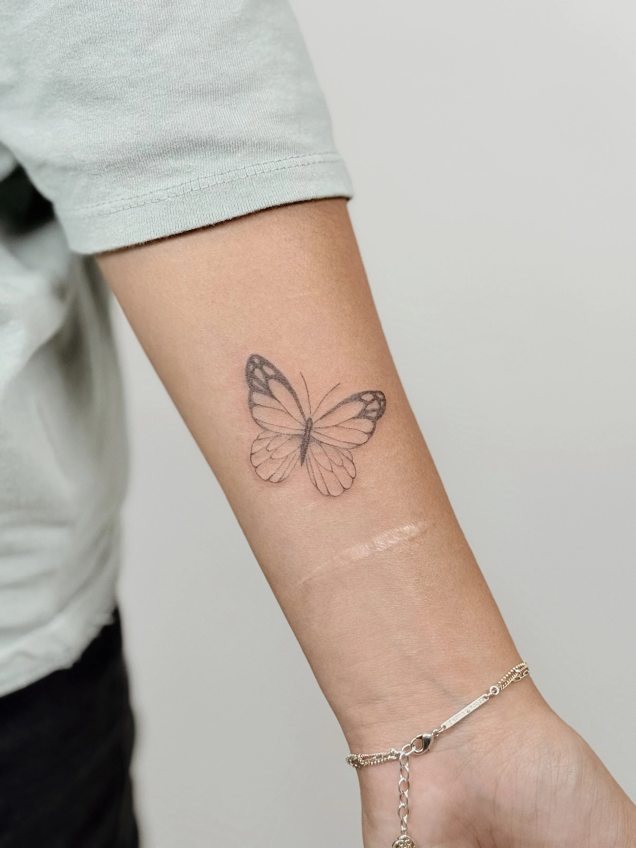 Wisconsin Fine Line Tattoo