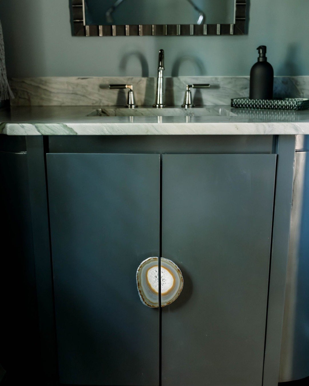 When the client asks for a moody manly bathroom that incorporates his love for golf, we deliver! Remember, your home should reflect YOUR unique personality and the things YOU love. We hate hearing people say they made design choices based on resale v