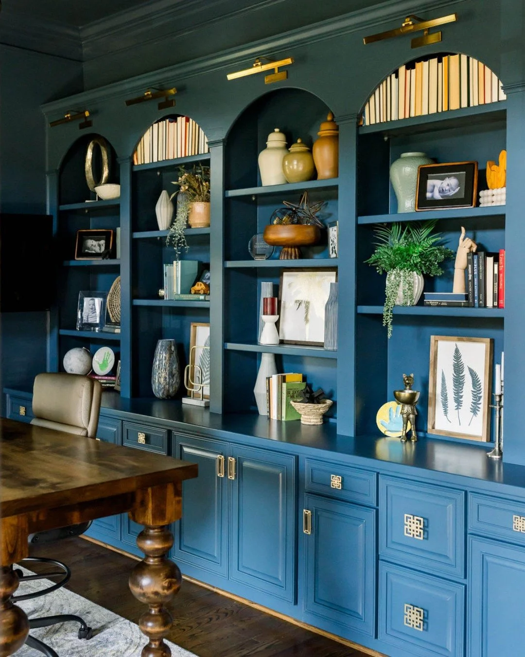 We&rsquo;re thrilled to show off one of our favorite office renovations we&rsquo;ve ever done! 
We&rsquo;ve teased it a little, and here is the full tour! We love when a client isn&rsquo;t afraid of color, and color drenching this room in a rich blue