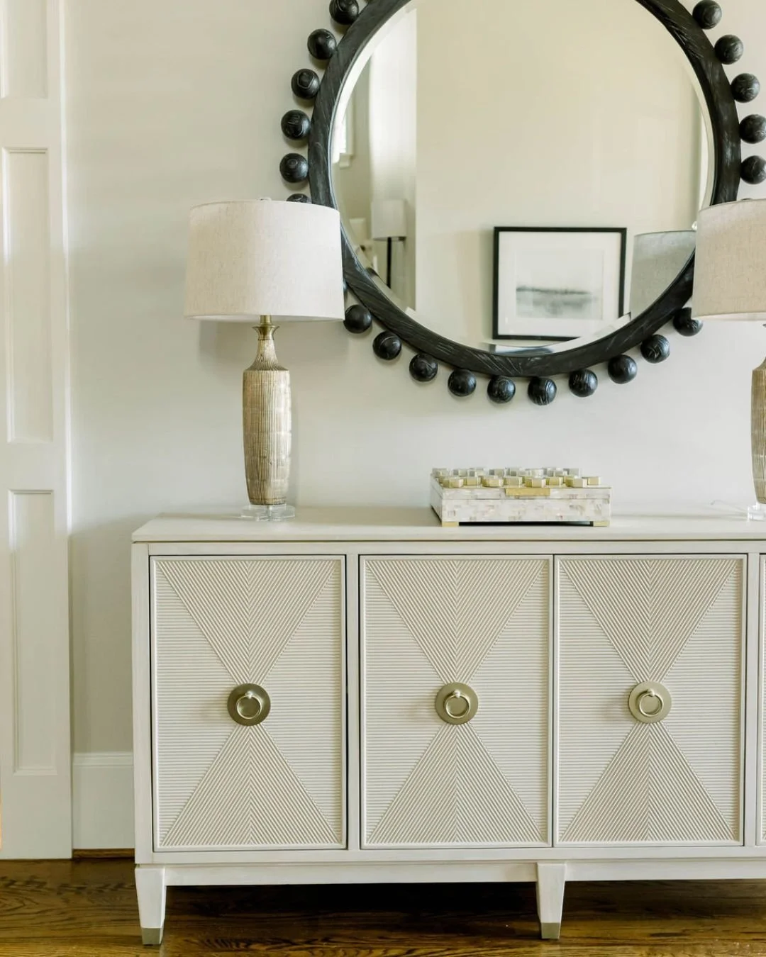 When styling a functional space like an entry table, we believe simplicity is key. With decor we aim for quality over quantity, ensuring each piece is both beautiful and practical. It&rsquo;s important to embrace negative space and allow your space t