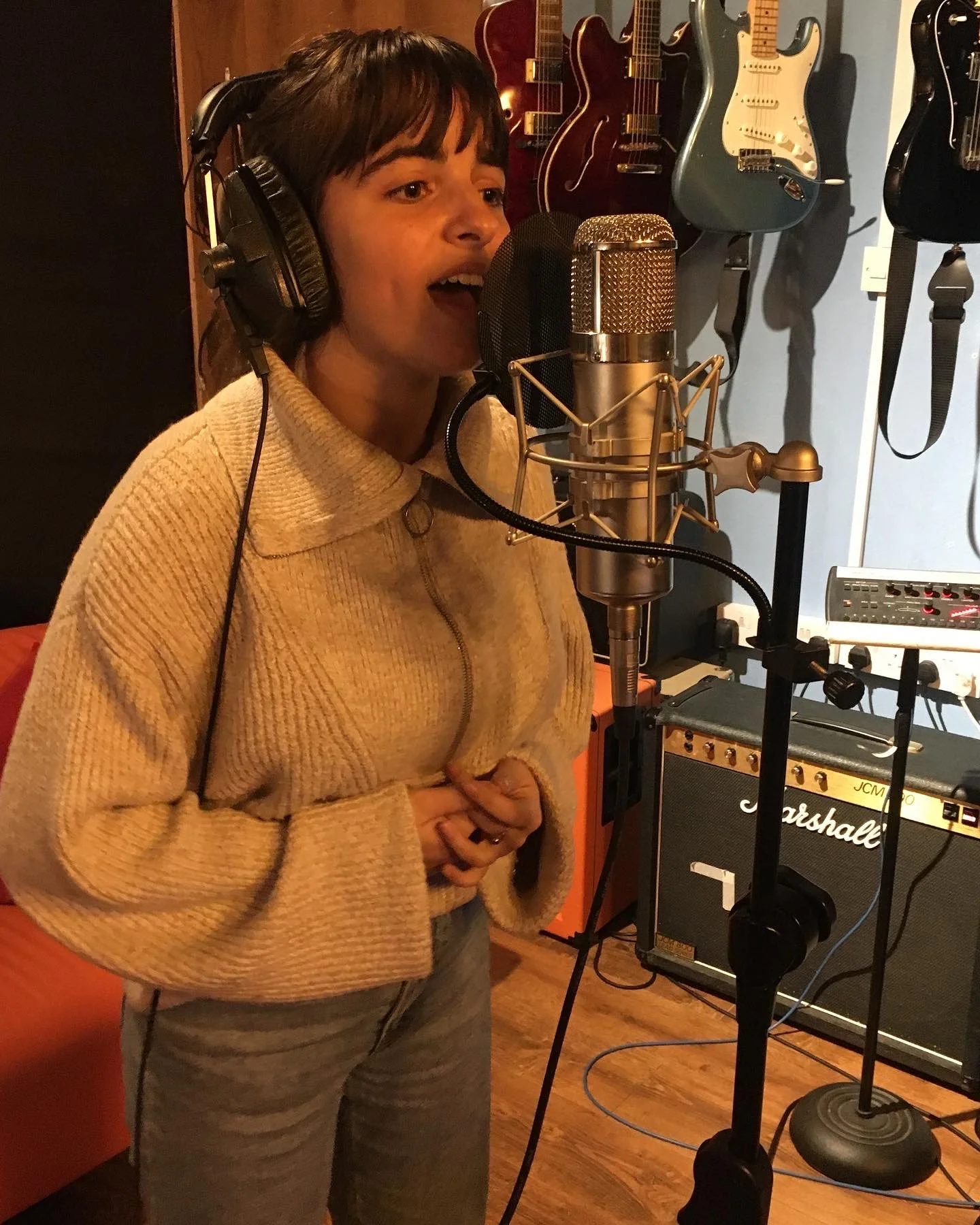 Alina recording vocals at Soundcaster Studios