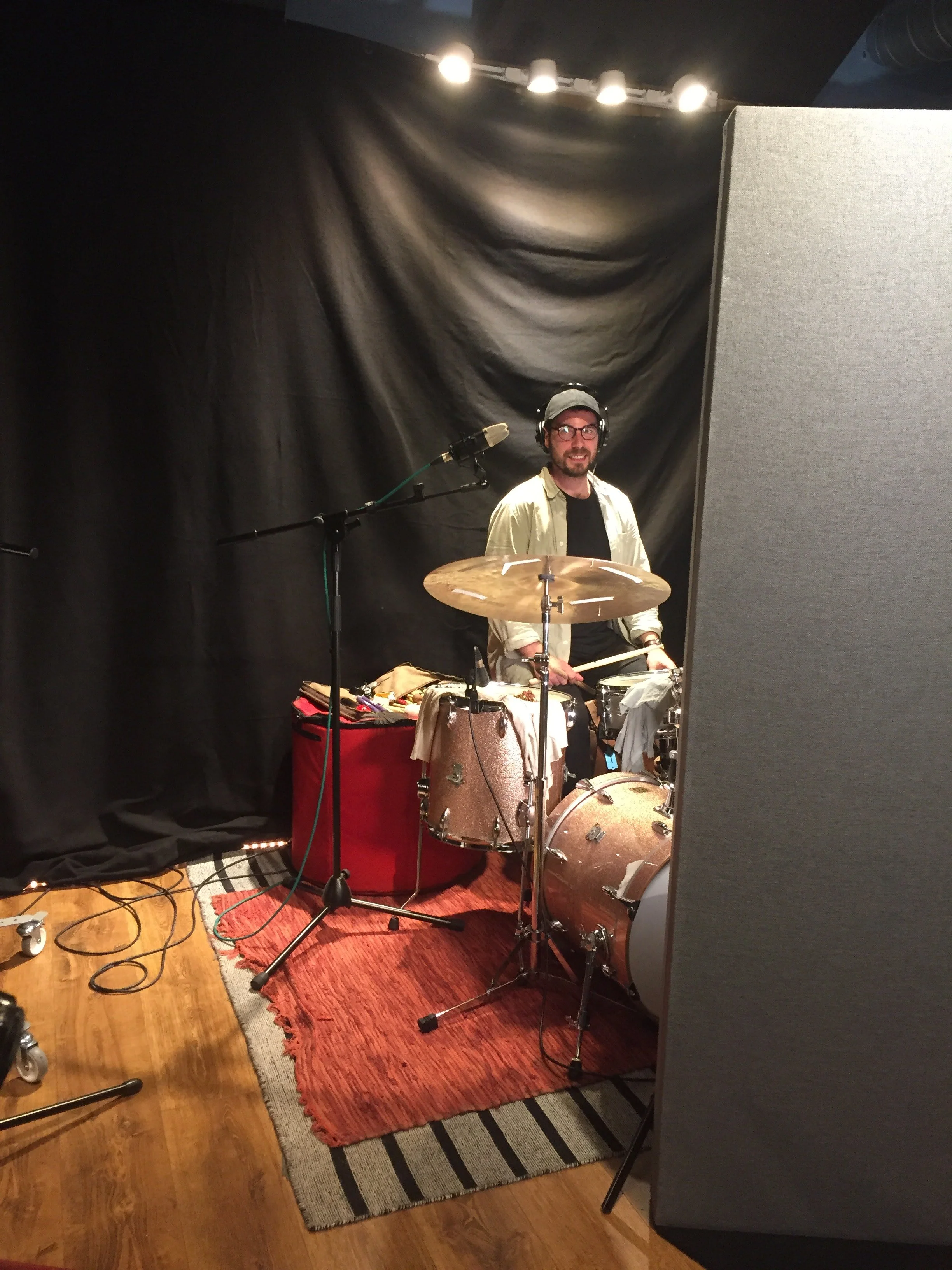 Drummer behind gobos