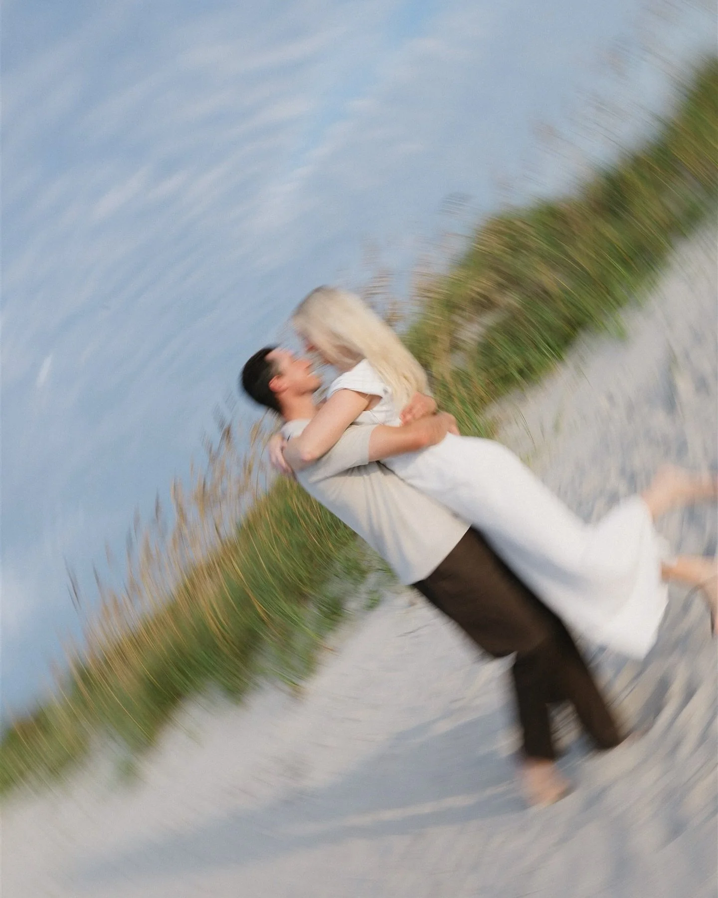 Cinematic, coastal, and a touch of golden light &mdash; A + H&rsquo;s sunrise engagement session on Isle of Palms feeling like a still straight from the screen of TSITP 🌊🎞️🐚