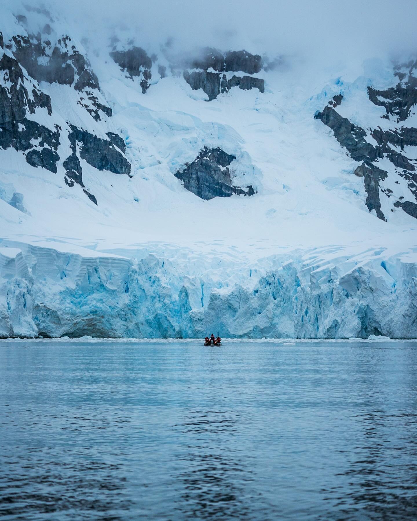 In a world of constant chatter, of noise, we seek out new ways to feel reconnected and in awe. That larger-than-life sensation evoked in big natural landscapes, shared human experiences, great acts of kindness and endeavor. In this sense, Antarctica 