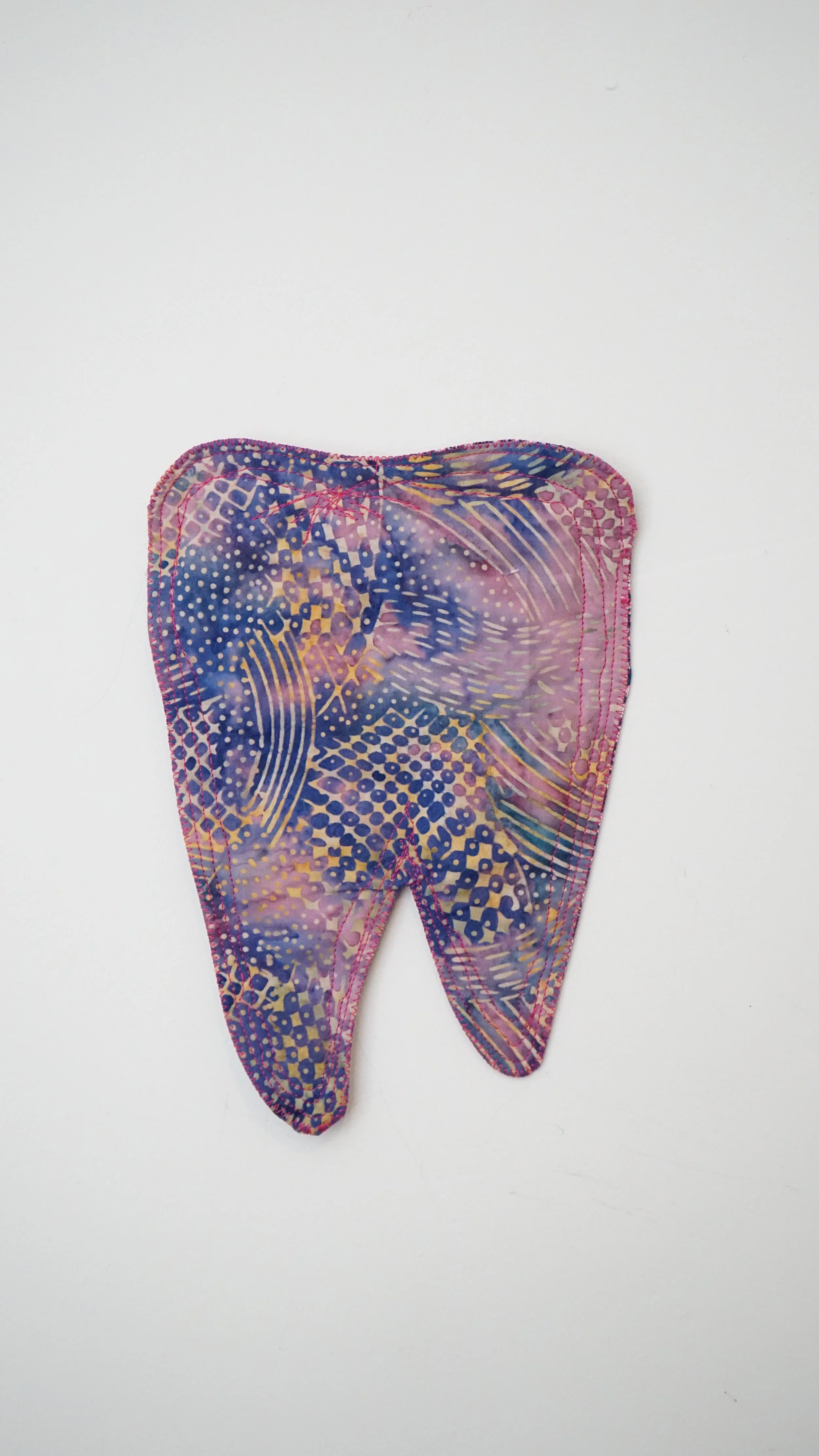 pink quilted tooth, fabric, thread, quilting, 2025