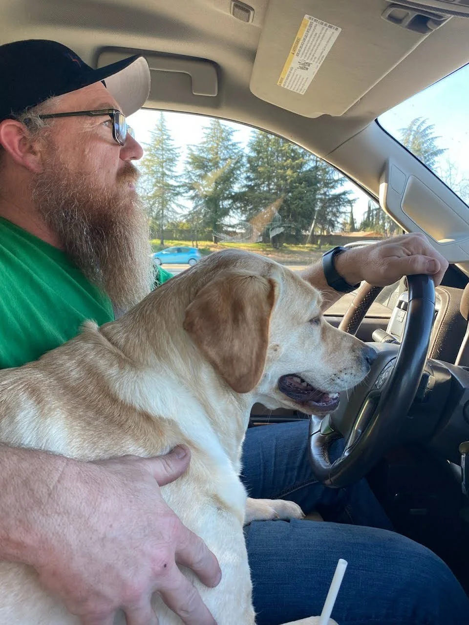 Sierra and Owner in the truck