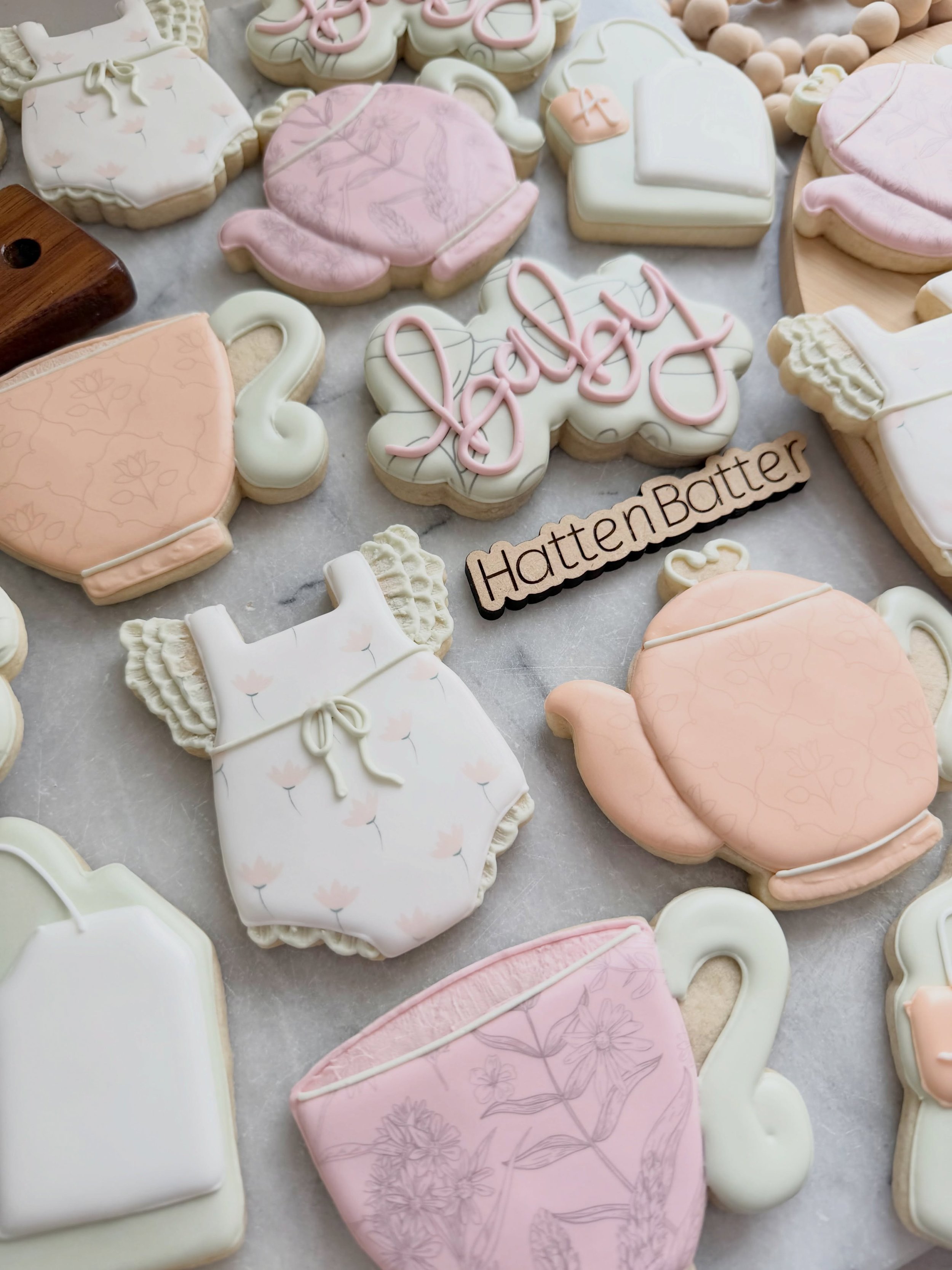 Sure, custom cookies are made to match your theme/event BUT they&rsquo;re also the edible art that announces your theme so you never have to say it 

Welcoming baby Avery with a tea party baby shower!