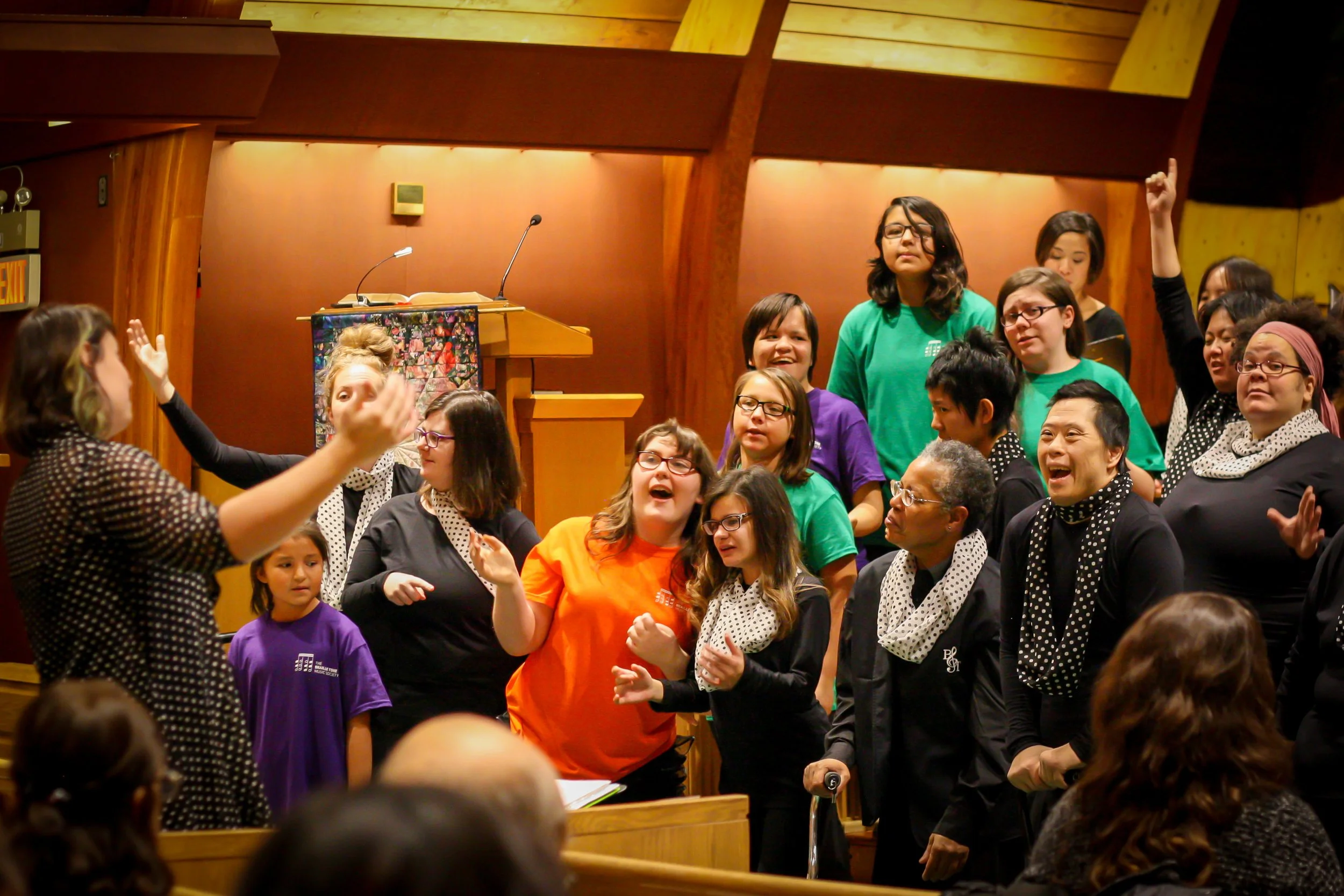 A group of members from the Children's Choir performing.