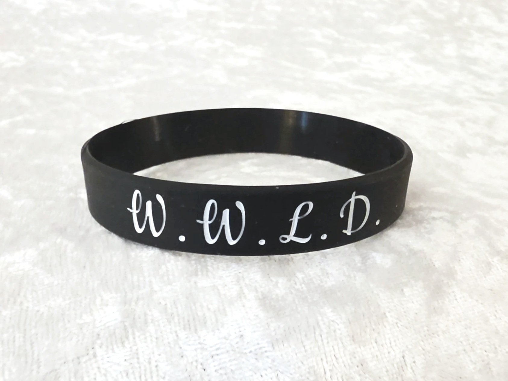 WWLD Wristband - White on Black Band - Fancy Script