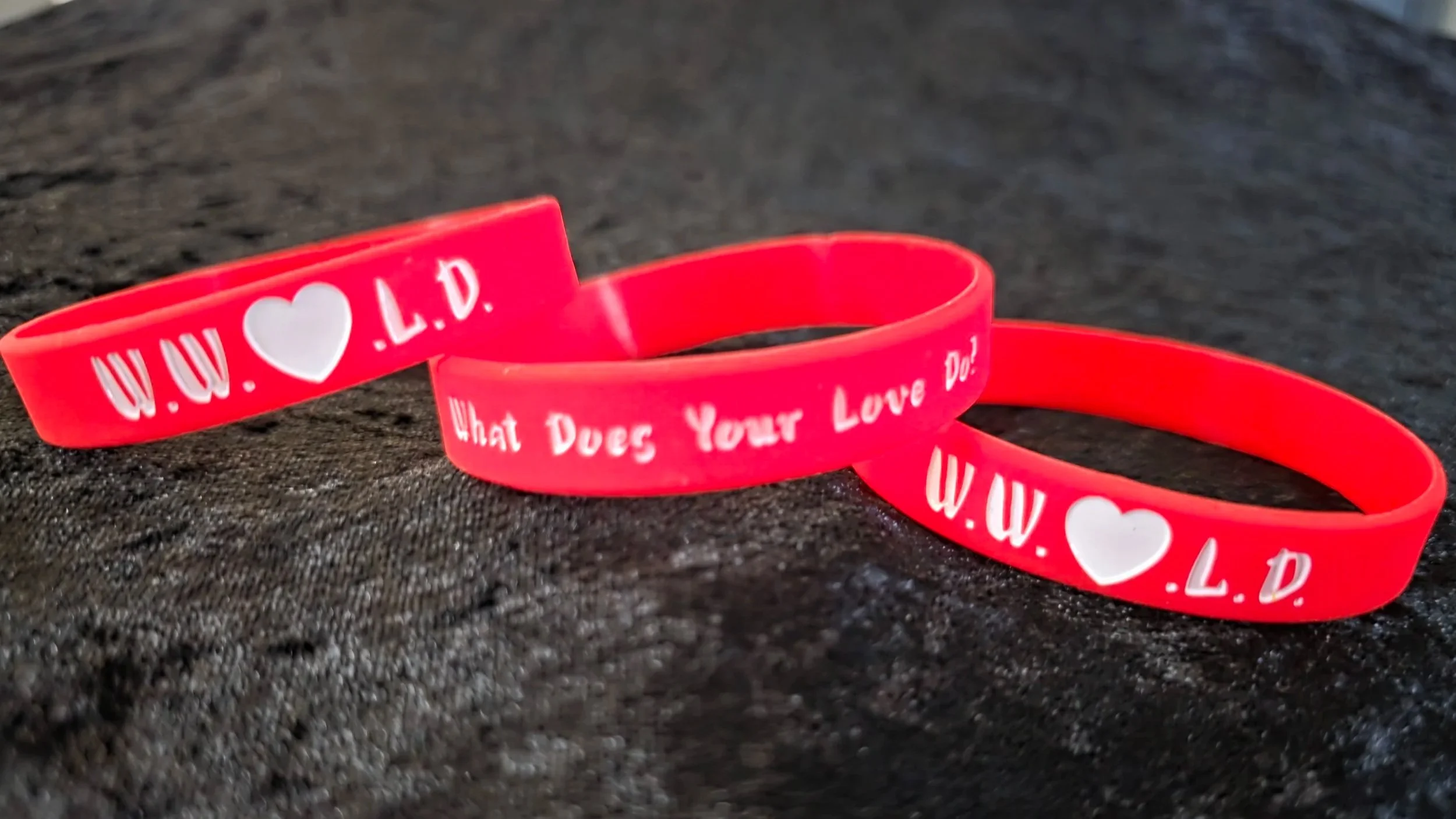 WWLoveDo+White+on+Red+Band+Bold+Candid+Black+Background.jpg