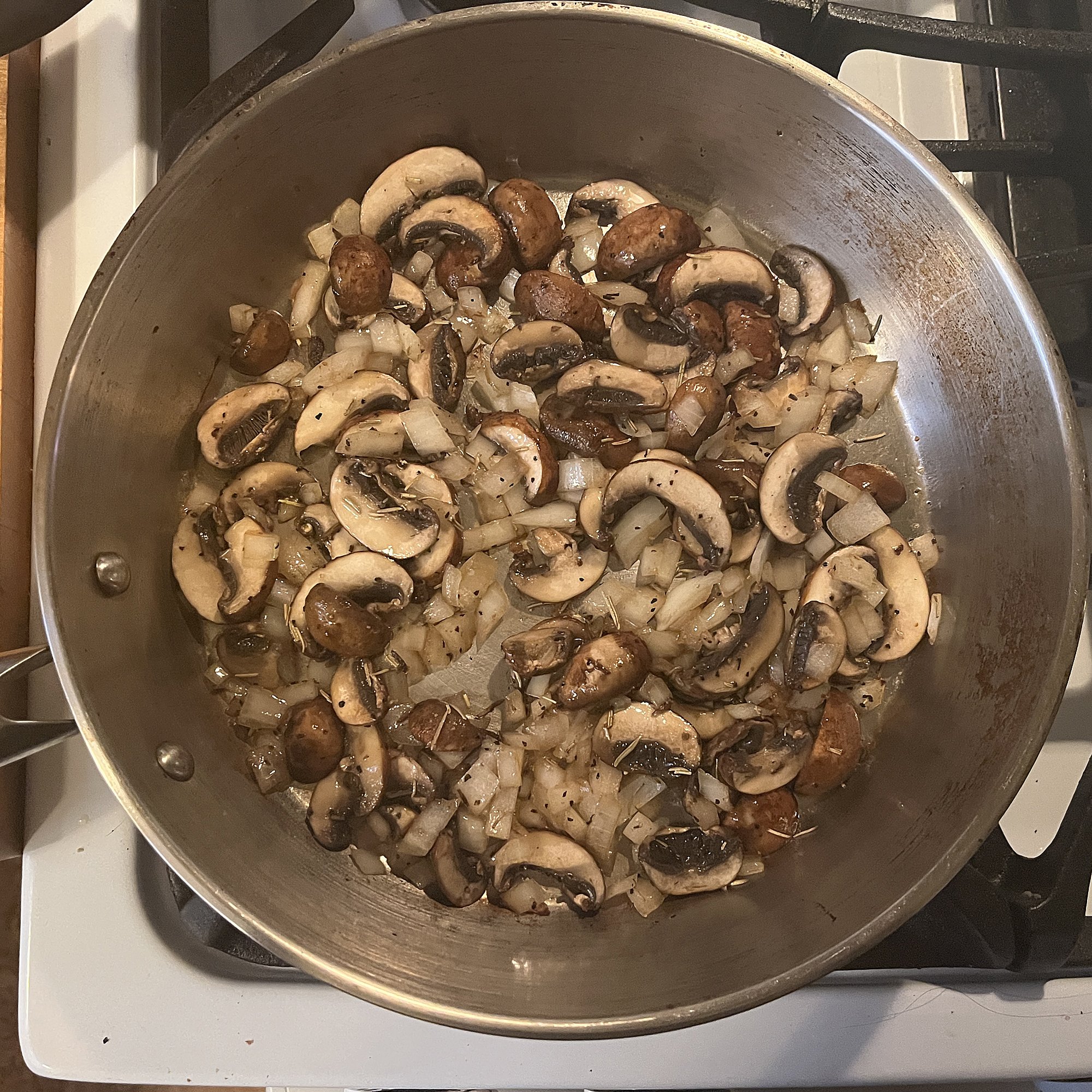 When mushrooms release their liquid and onions are cooked through, remove from heat and...