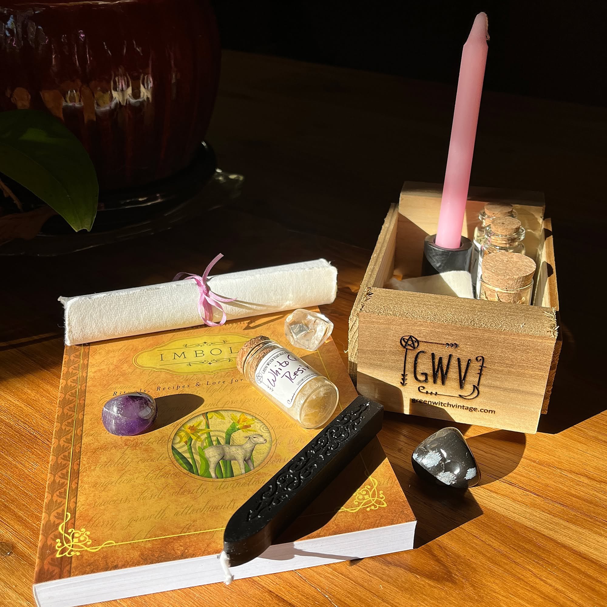 To celebrate Imbolc this year, we're giving away this gift set worth more than $40 retail. It includes Llewellyn's Sabbat Essentials Imbolc book and GWV's new Imbolc Celebration Set, which includes:
- one handmade reclaimed-wood crate
- one amethyst,
