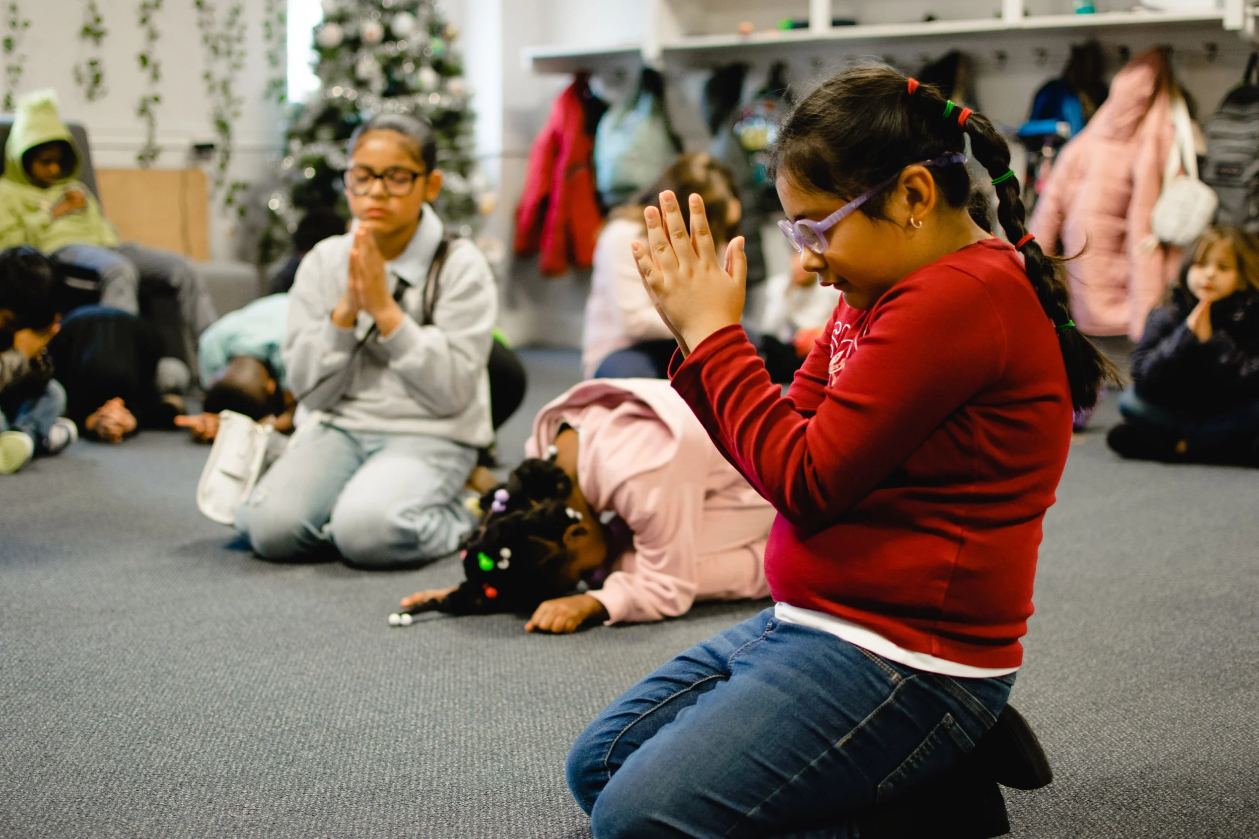 child praying At a private Christian school in Chesterfield and Midlothian