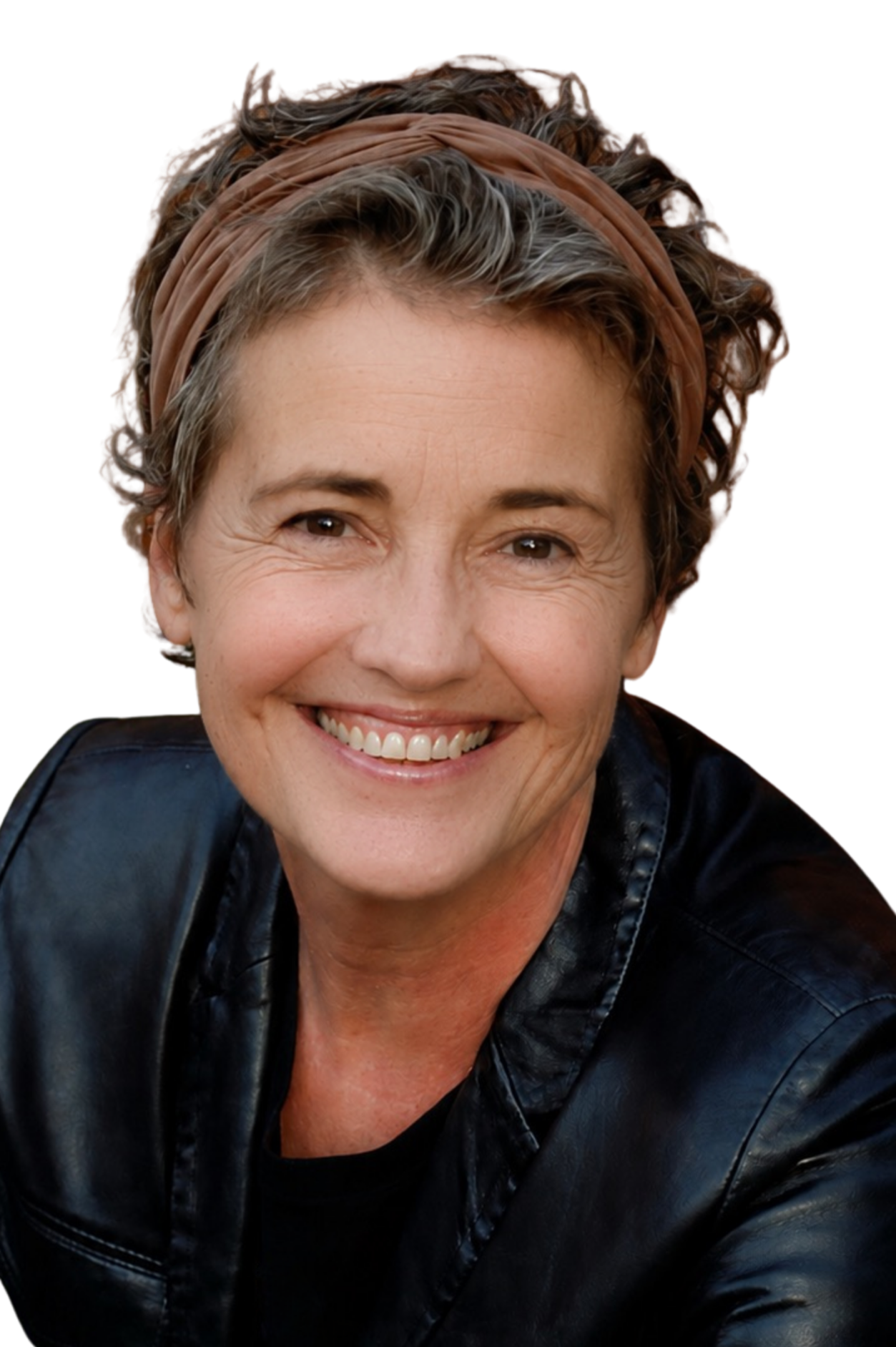 A smiling woman with short curly hair wearing a brown headband and a black leather jacket, looking at the camera.