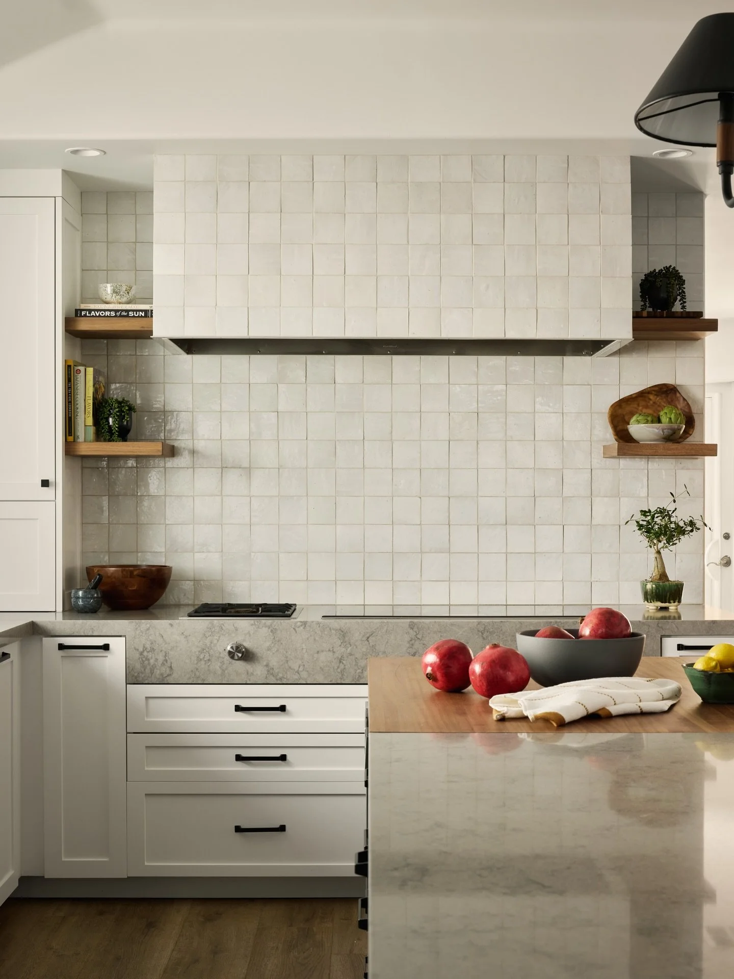 Talk about transformation! This kitchen went from cramped, dark and dated to open, bright and completely revitalized! With separate areas for chef-level cooking, eating and lounging, this became the kitchen of our clients&rsquo; dreams. Nothing makes