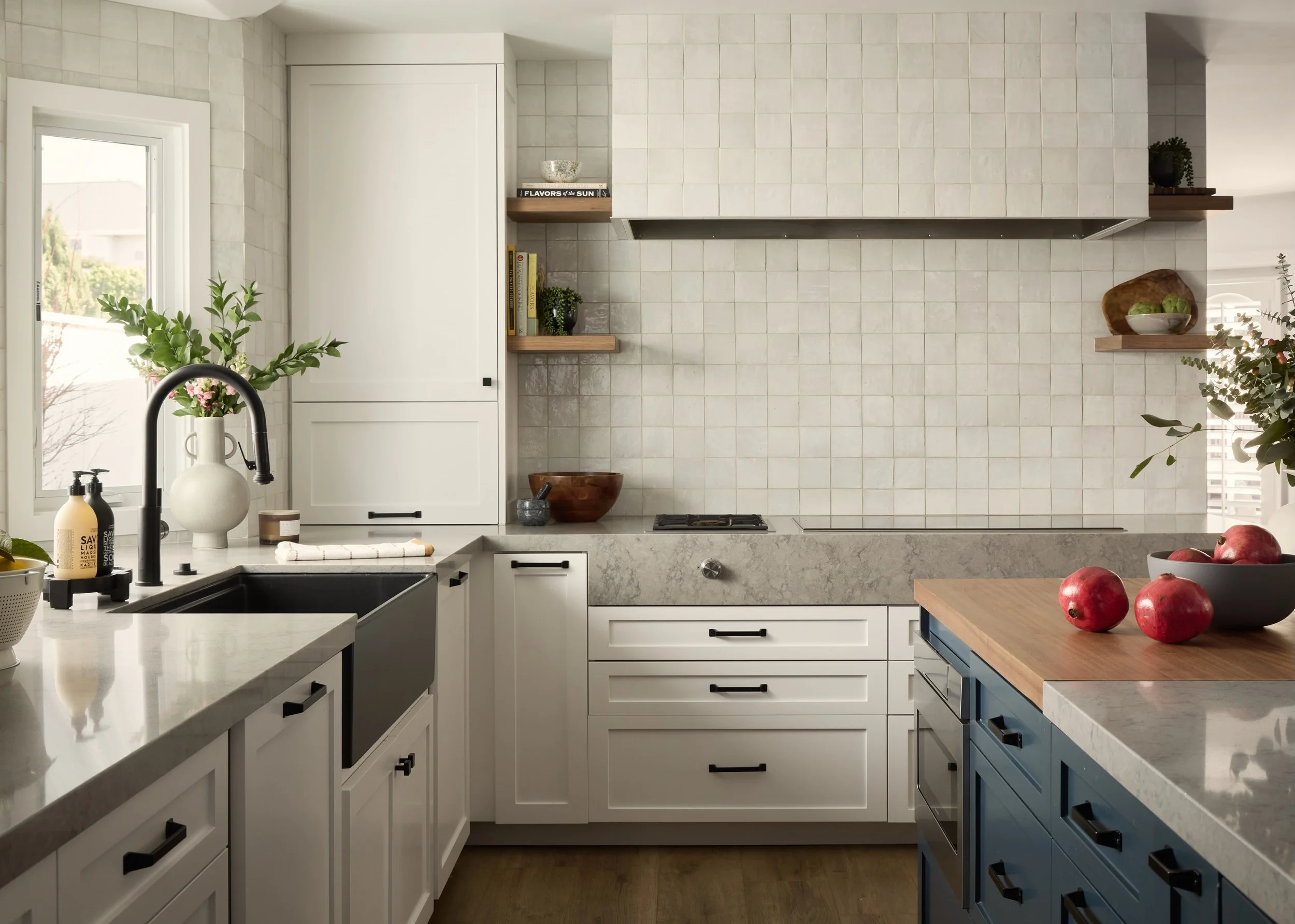 Three things I put in nearly every project, no matter the style: 1) Visual interest at the cooktop: custom hoods, beautiful lighting, and open walls. 2) Mixed metals - don&rsquo;t be afraid to layer different finishes! 3) Fun elements in the Powder R