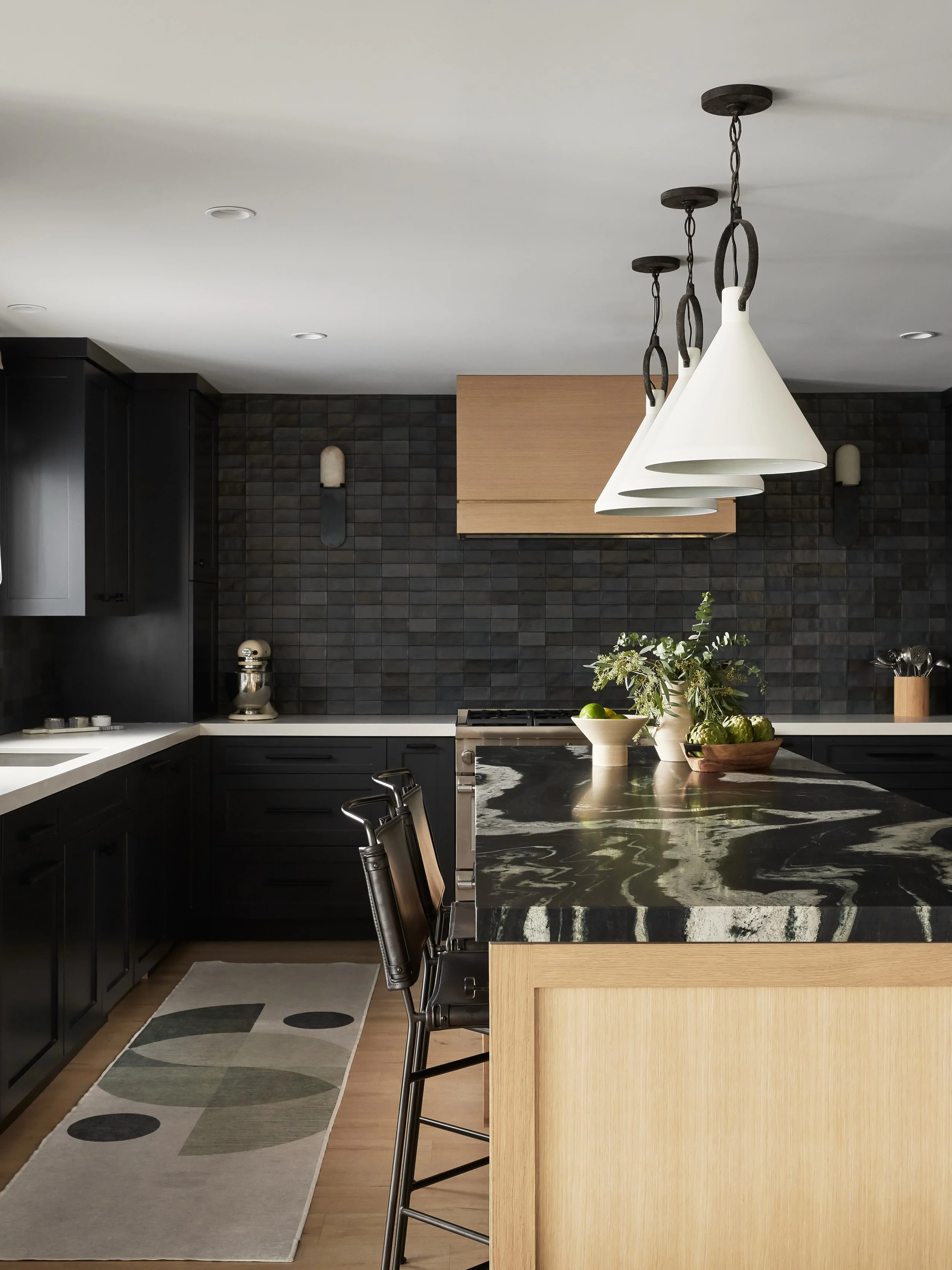 Here&rsquo;s your sign not to let Dark and Moody rooms scare you off. Happy Halloween Weekend, everyone! 🎃👻💀
Photos: @joshbustosphoto 
All designs: @anthologyinteriors 

#darkandmoody #interiors #blackkitchen