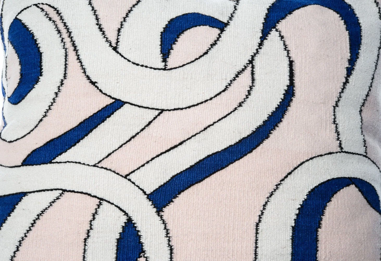 Mexchic handwoven floor pillow curvy loops pink blue cream contemporary craft Quetzalcoatl plumed serpent Oaxaca teotitlan del valle Mexican design