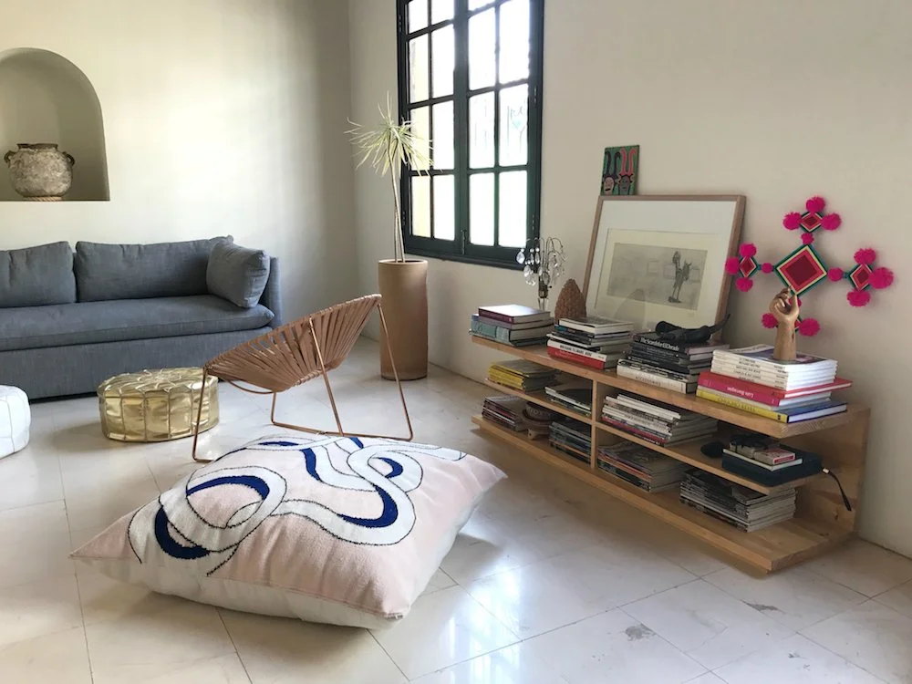 Mexchic handwoven floor pillow curvy loops pink blue cream contemporary craft Quetzalcoatl plumed serpent Oaxaca teotitlan del valle Mexican design