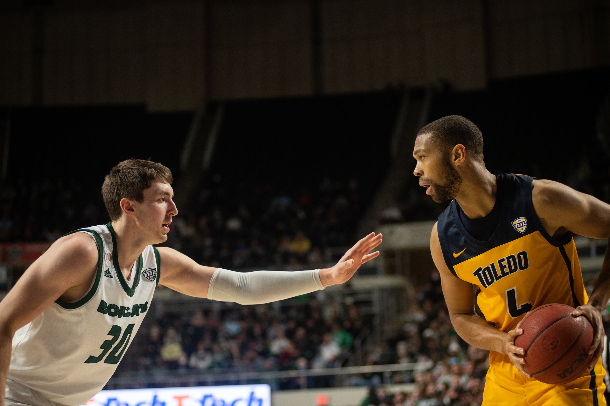 Ohio forward Jason Carter (30) guards Toledo forward Setrick Millner Jr. (4) at The Convo in Athens, Ohio on Jan. 21, 2021.
