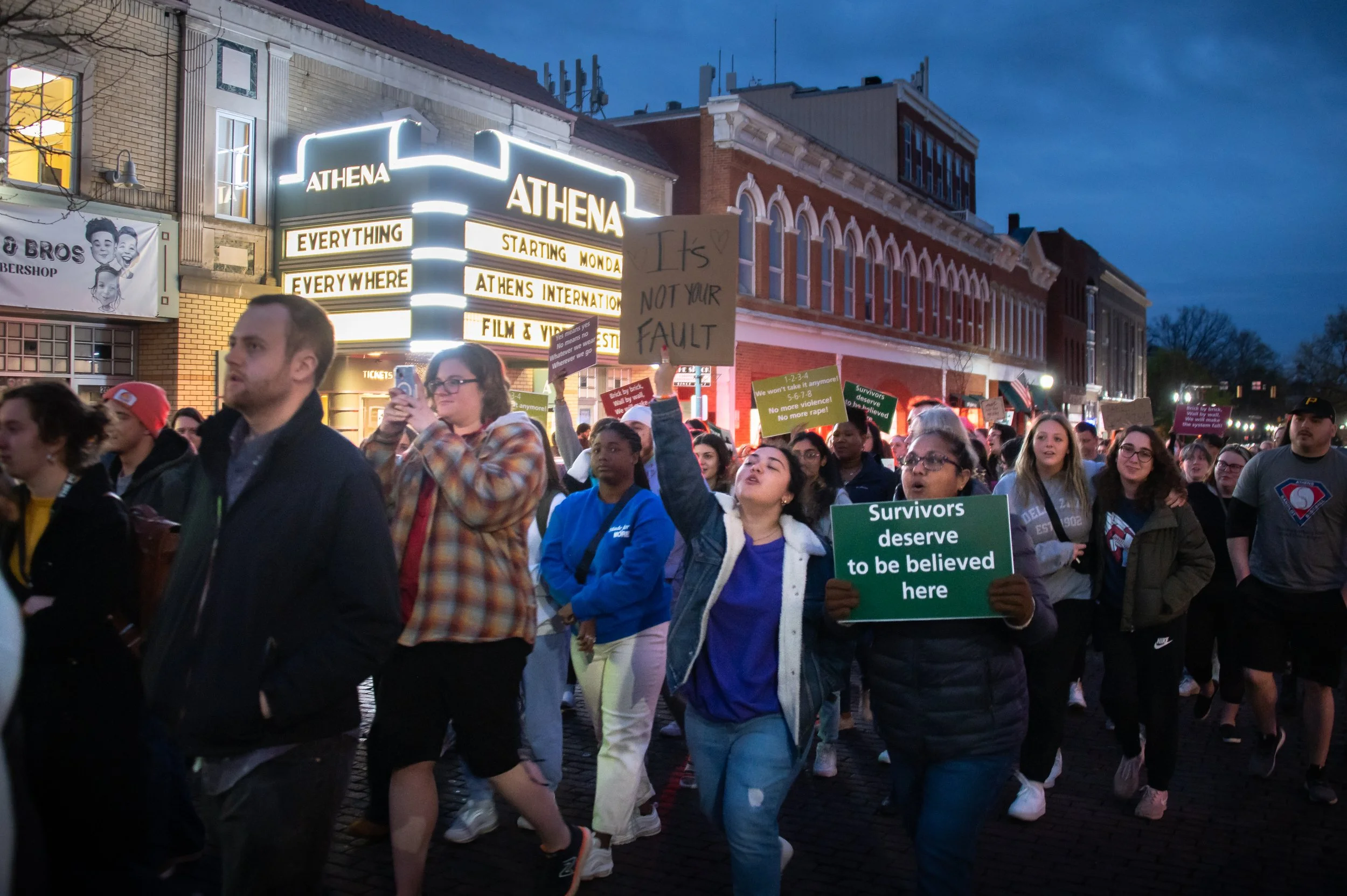 Demonstrators march during "Take Back the Night", an event designed to promote awareness of sexual and domestic violence on April 6, 2023 in Athens, Ohio.