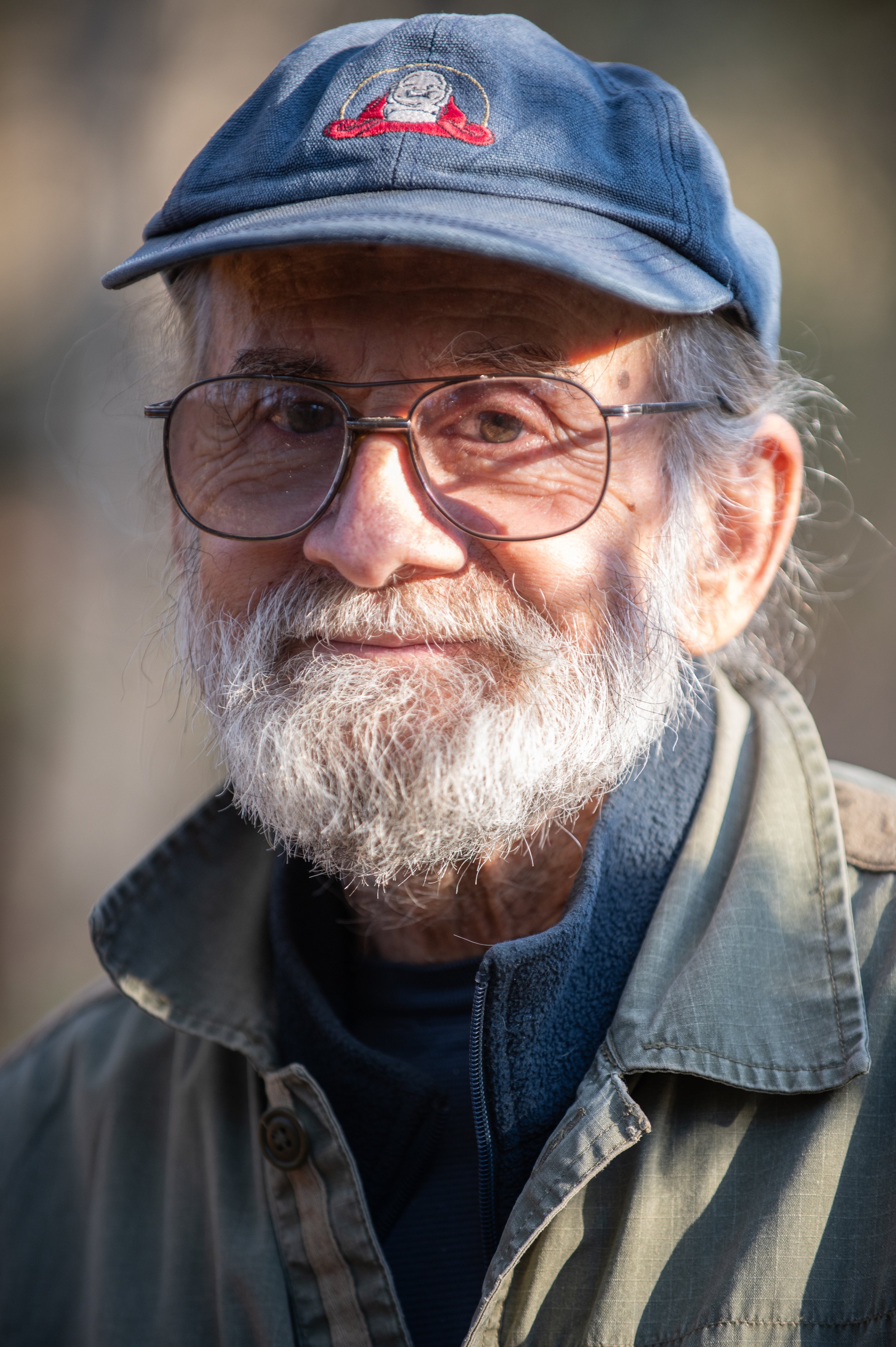 Bob Henninge, an original founding member of the Currents community, poses for a portrait at Currents, located in Glouster, Ohio on Nov. 1, 2023. “I literally do feel like Currents is my child… It’s something that I helped give birth to." says Hennin