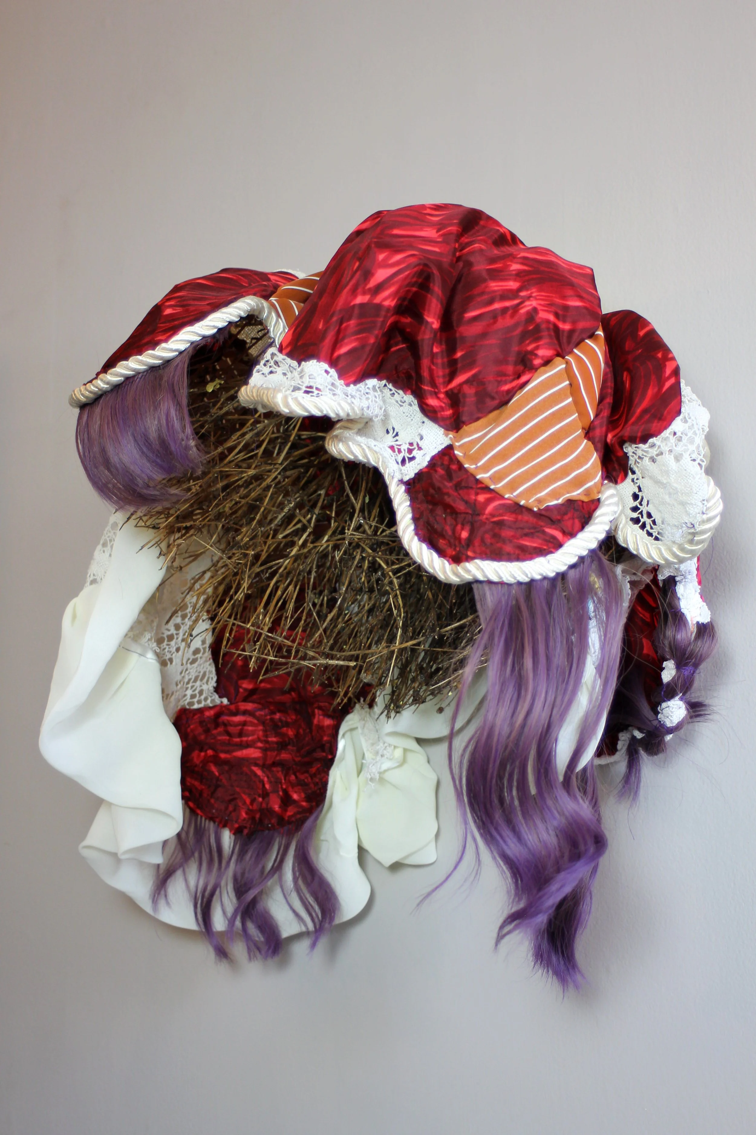 Trying My Best to Be Someone Else, synthetic hair, fabric, yarn, and dead bush, 21X23X14"