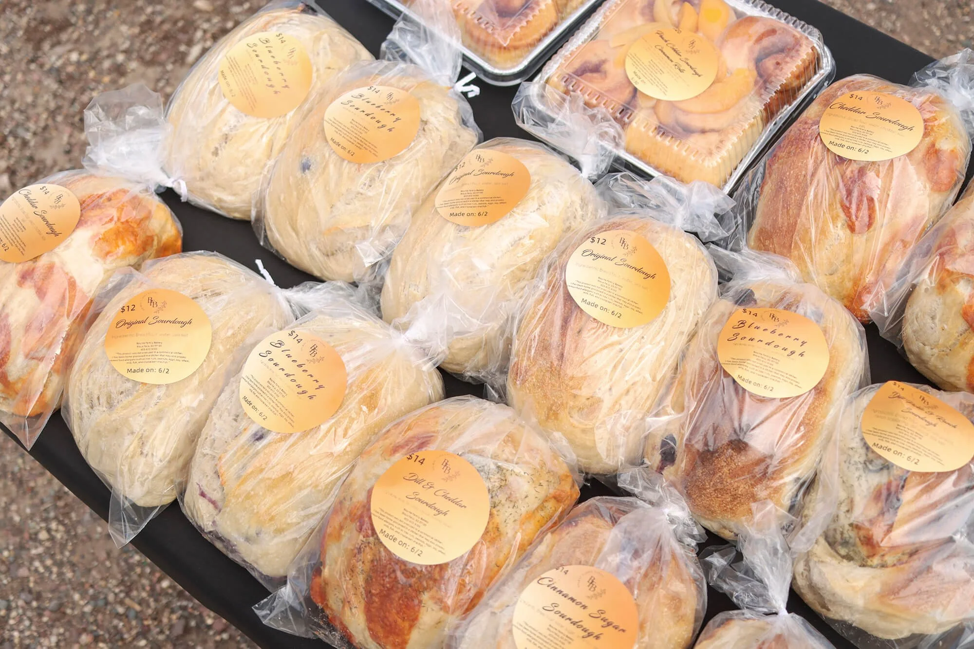 rows of flavored sourdough and cinnamon rolls