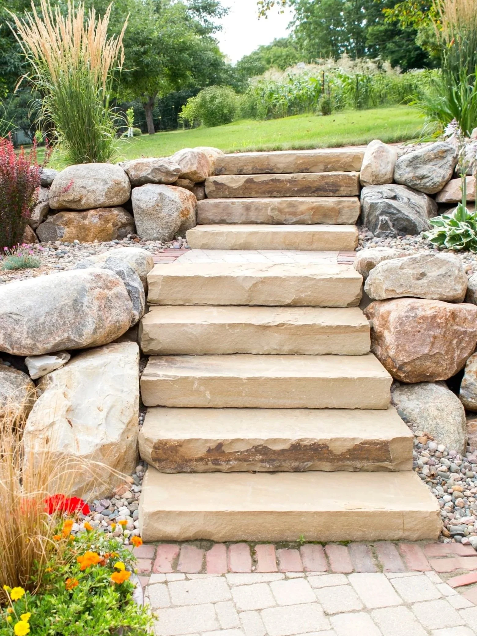 rock steps with rock landscaping surrounding