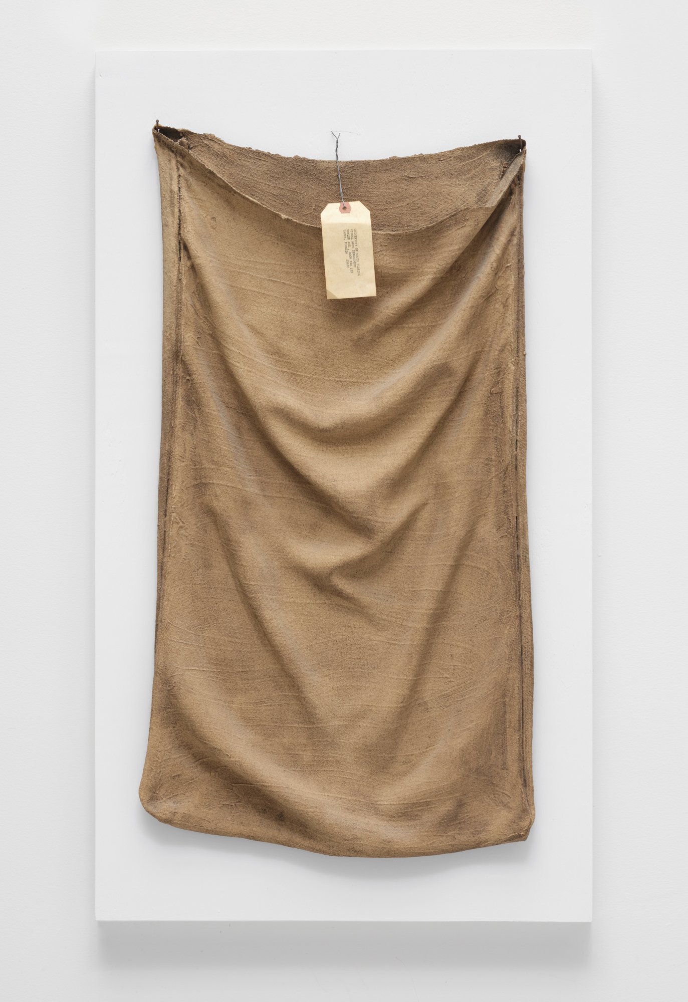 Robert Rauschenberg, Tampa Clay Piece 5, BAT, 1972. Clay slip with fiberglass bag with collage and soil pating. 34 x 18 x 3 in. For Jordan Schnitzer Family Foundation.