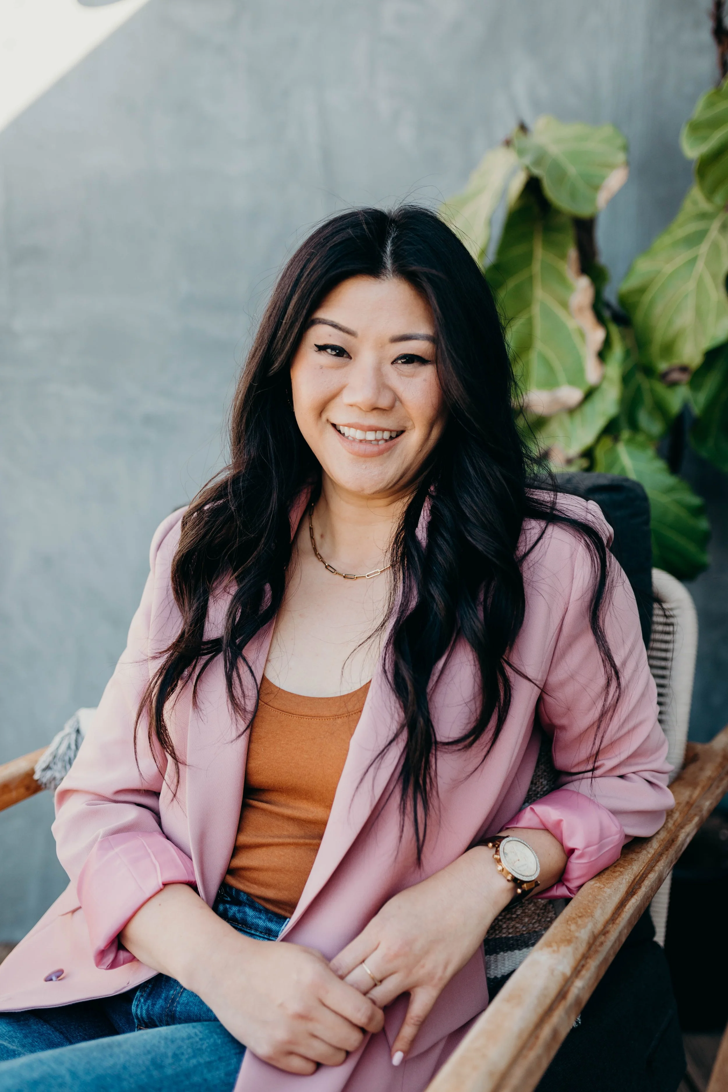 Asian American therapist providing culturally responsive therapy online