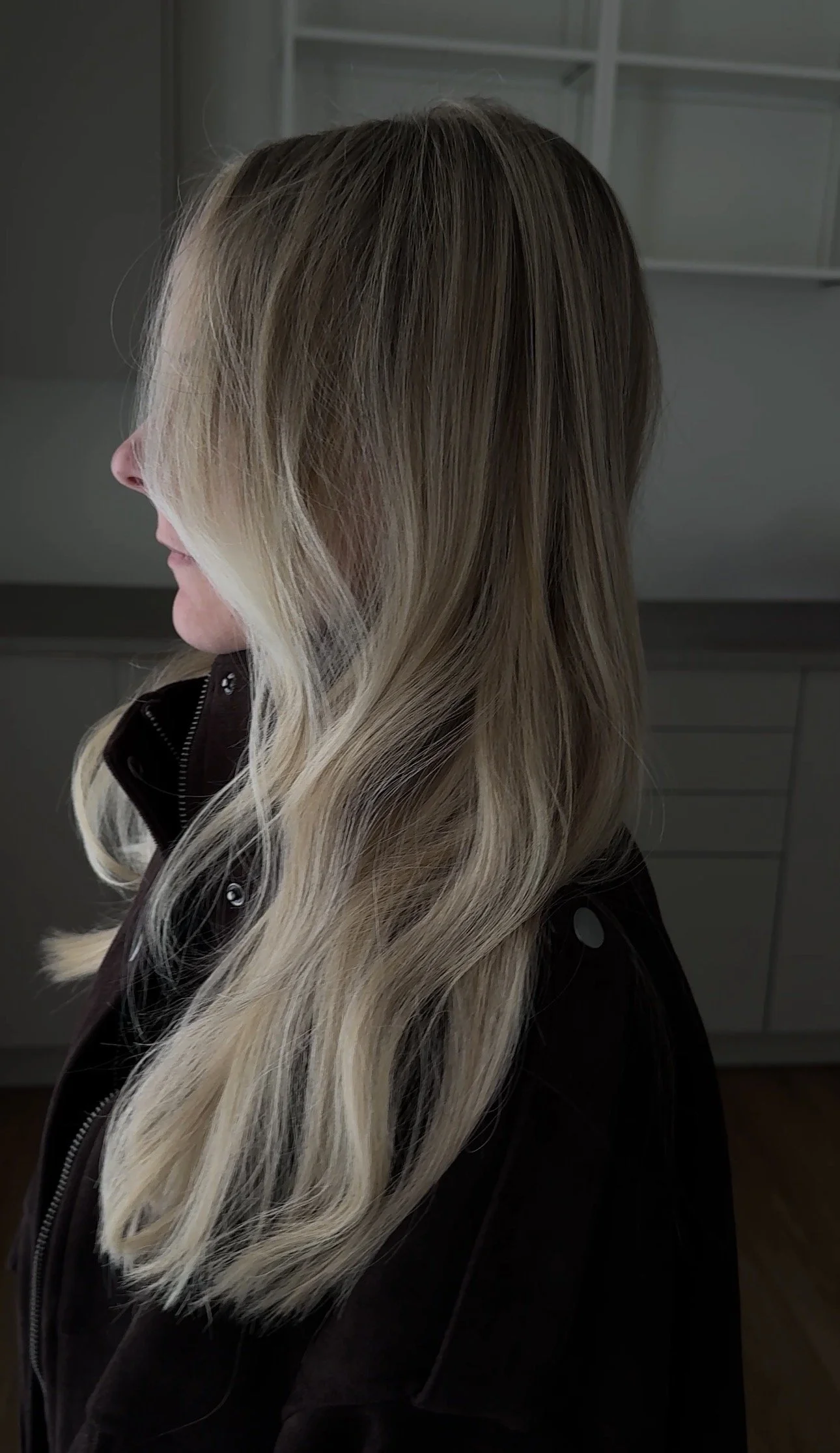 After one row of seamless hair extensions by Sarah Huff in Grand Haven, MI: fuller, blended blonde