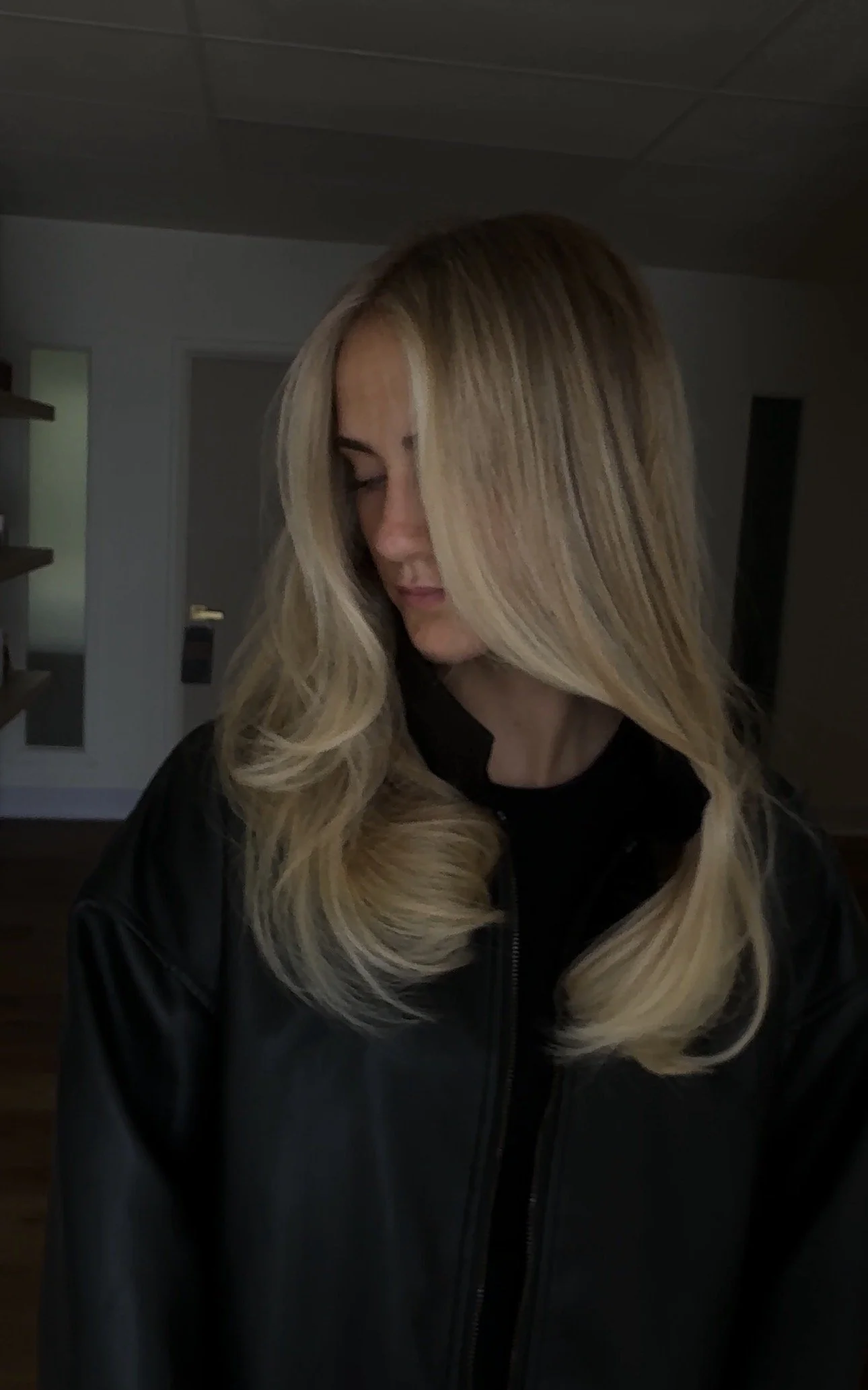 Golden lived-in blonde with long face-framing layers by Sarah Huff in Grand Haven, MI