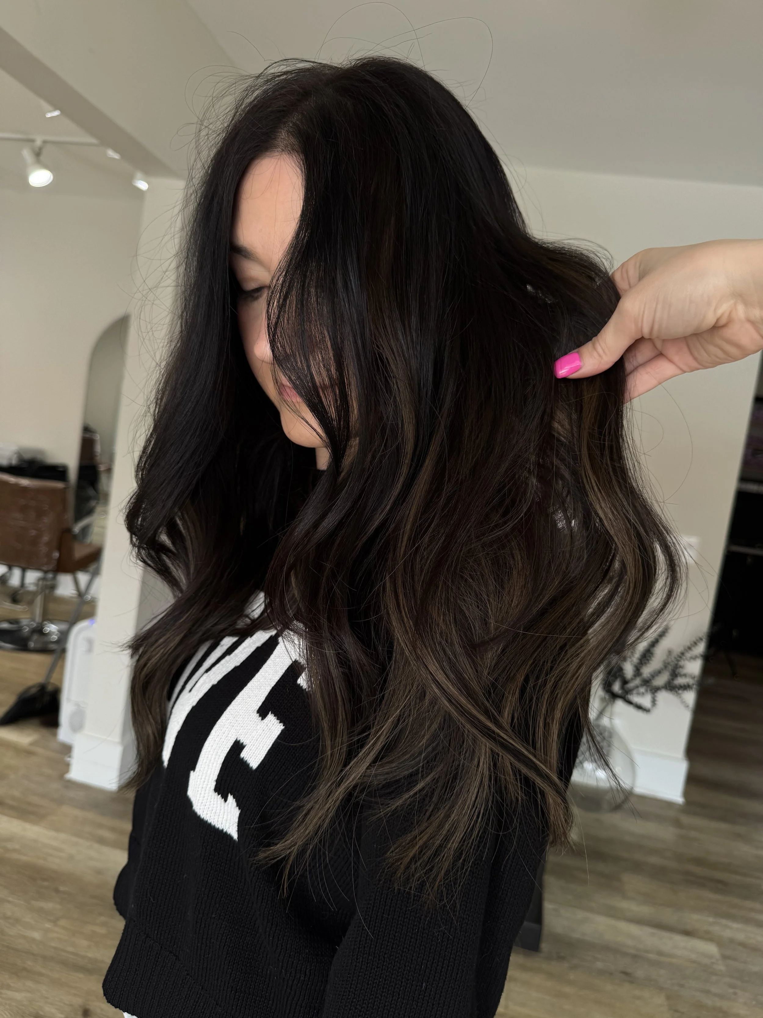 Modern salon in Holland MI for extensions and blonding serving Grand Rapids and beyond.