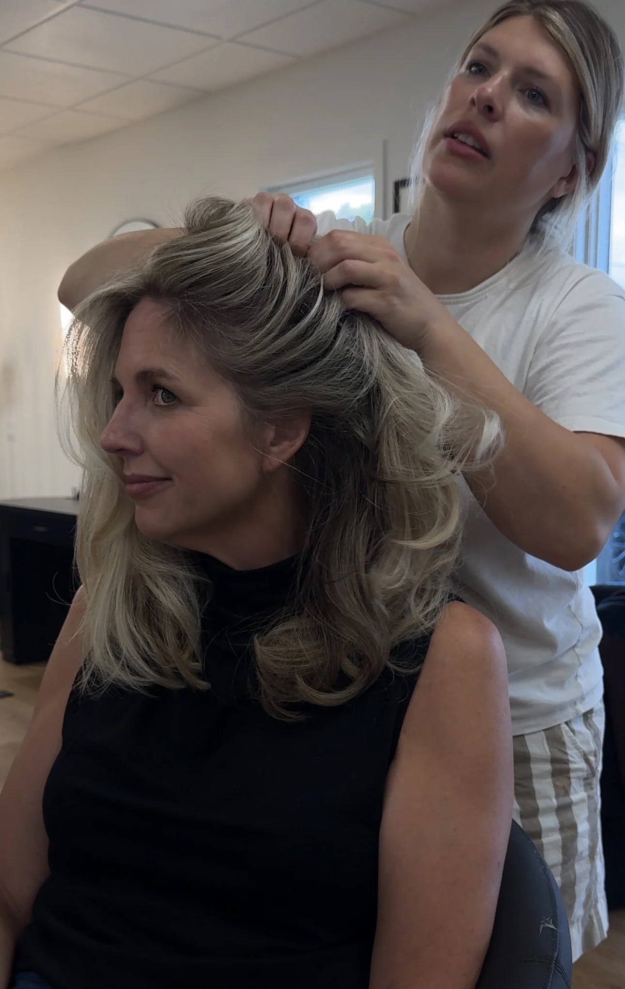 Sarah Huff styling a dimensional lived-in blonde at Ardor+Grit in Grand Haven, MI
