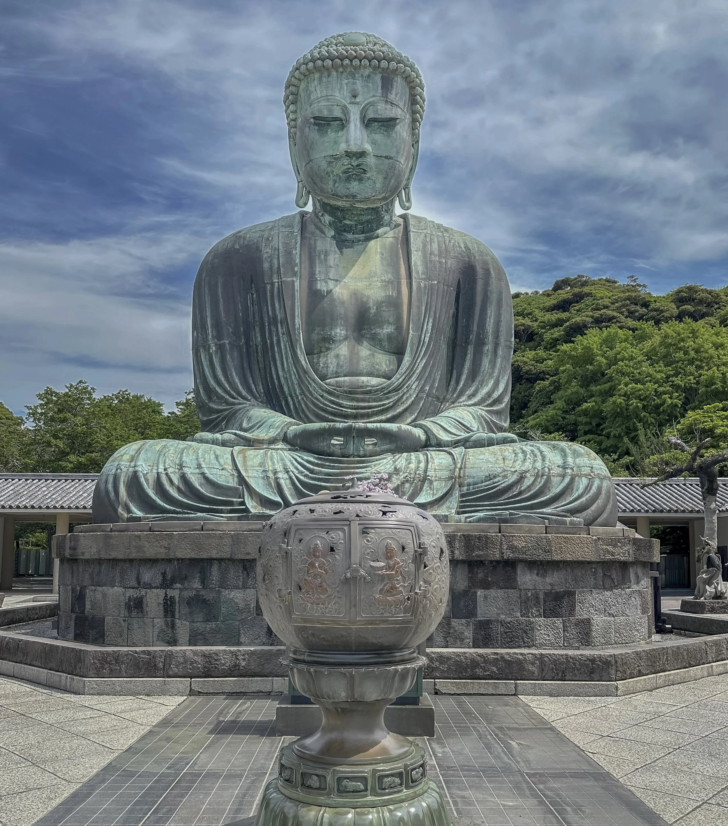 Great Buddha of Kamakura — Kōtoku-in Temple, Kamakura, Japan.

The Great Buddha sits in calm meditation, its weathered bronze surface softened by centuries of sky, rain, and time.